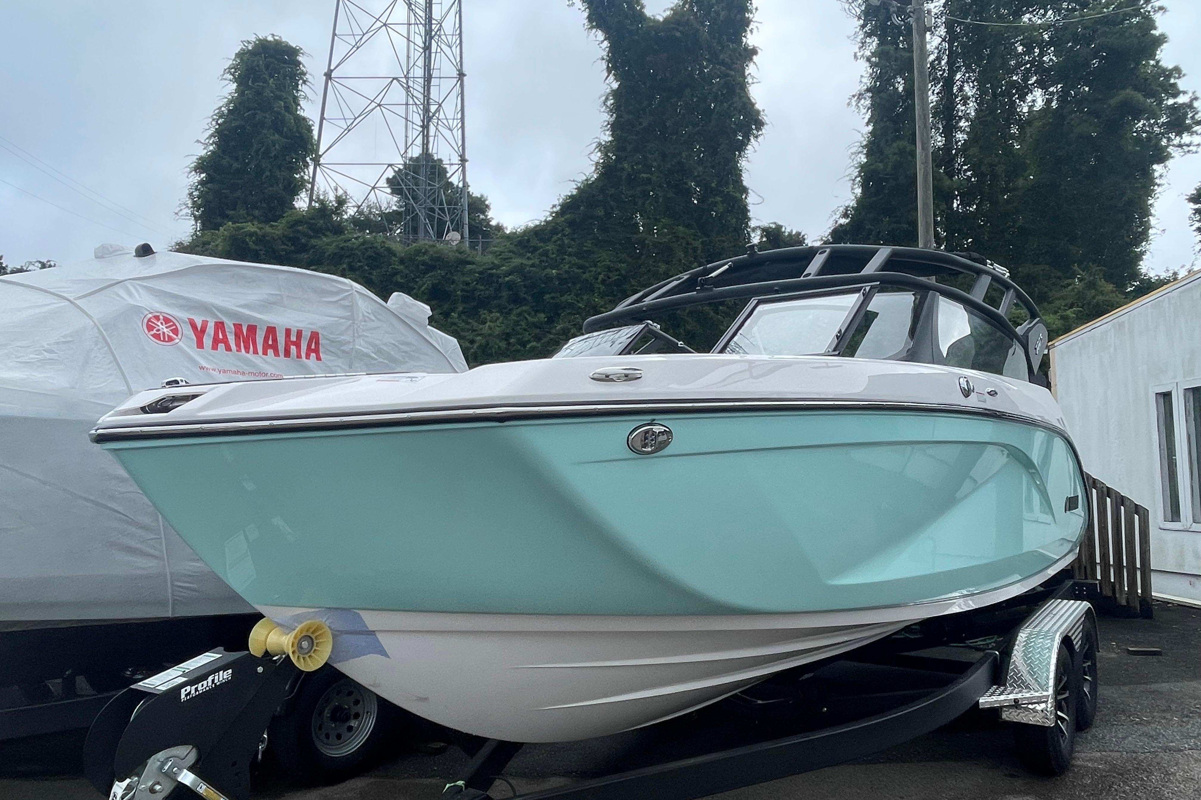 2026 Yamaha Boats 222S in light blue on trailer, outdoor setting.