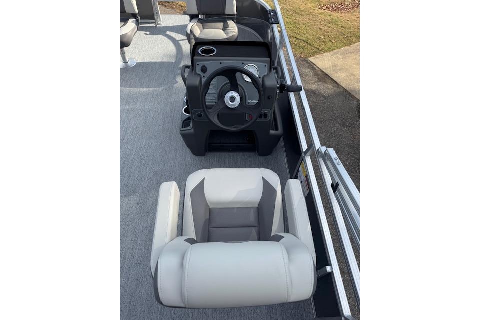 2026 Sun Tracker Bass Buggy 16 XL Select boat interior with steering console and seating.