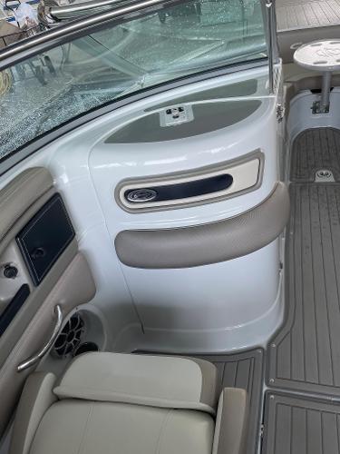 2019 Crownline E255 boat interior with seating and control panel.