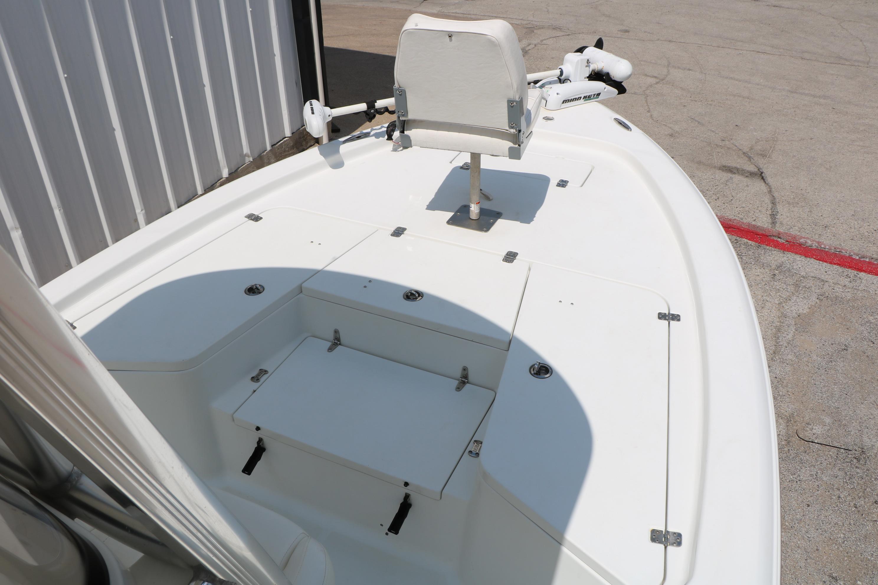 2015 Sea Hunt BX 22 BR boat deck with seating and storage compartments.