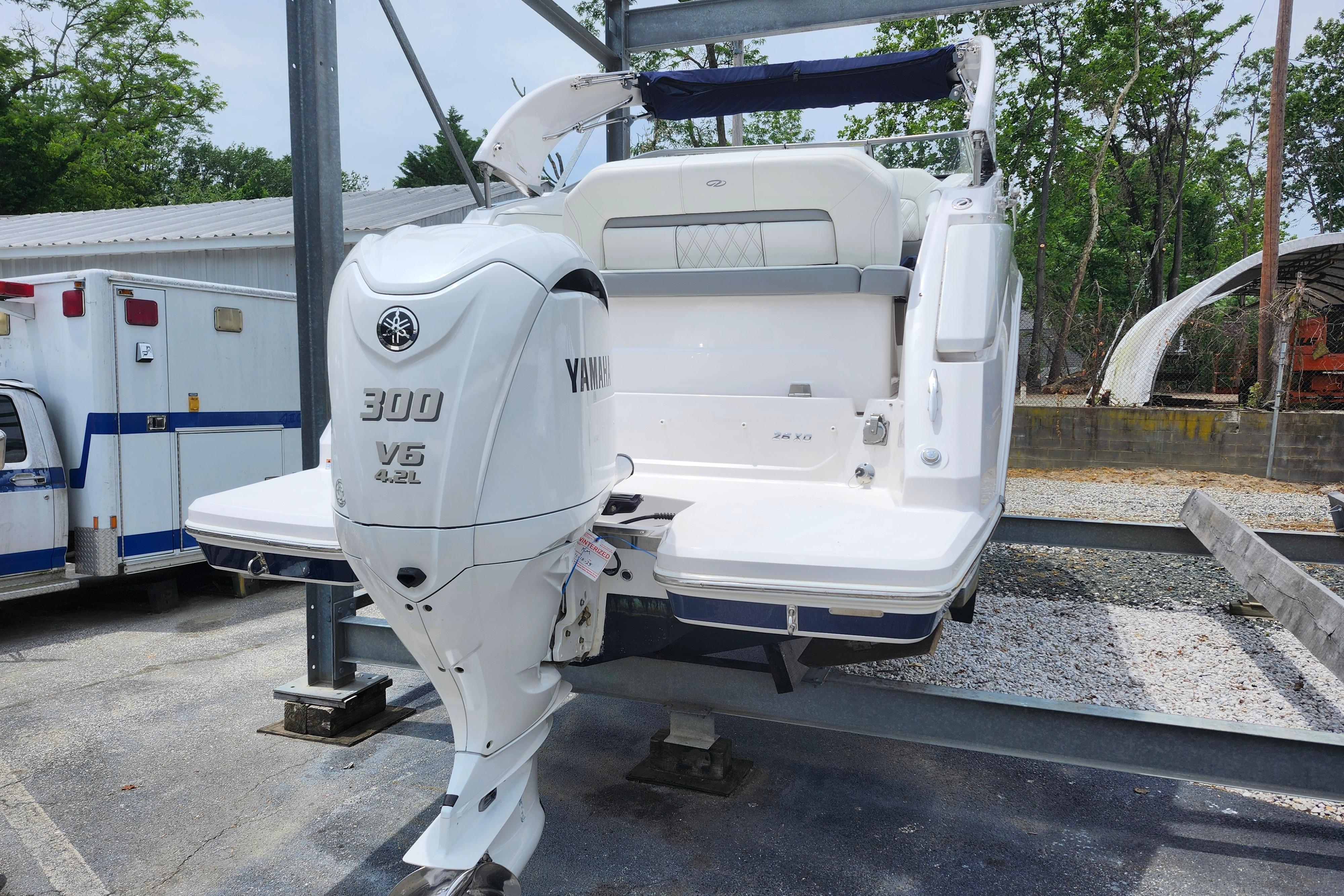 2022 Regal 26 XO boat with Yamaha 300 V6 engine on a trailer.