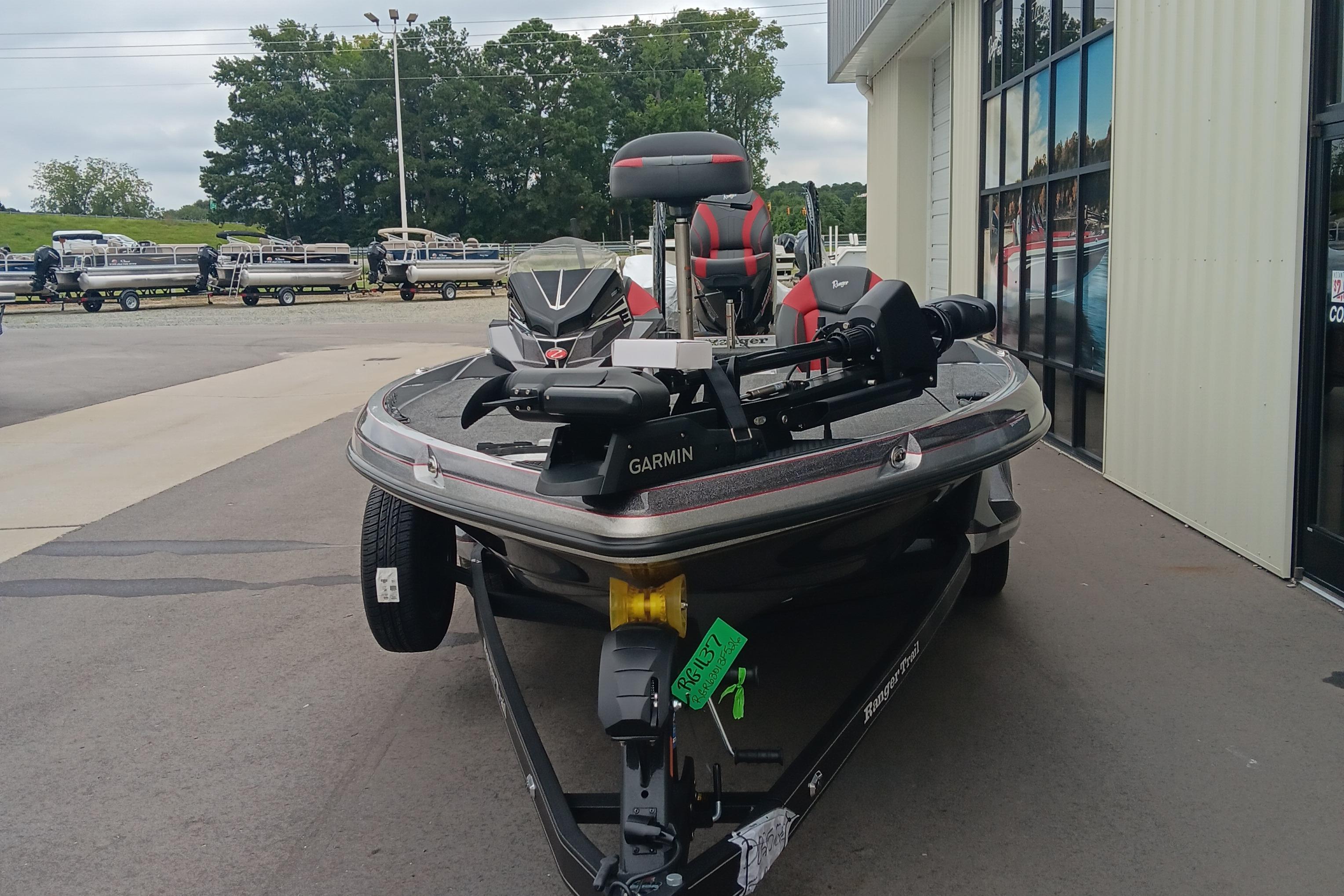 2026 Ranger Z520 boat with Garmin equipment, parked outside a showroom.