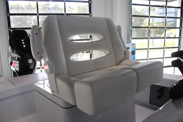 2025 East Cape 25 Open boat seat in a showroom setting.