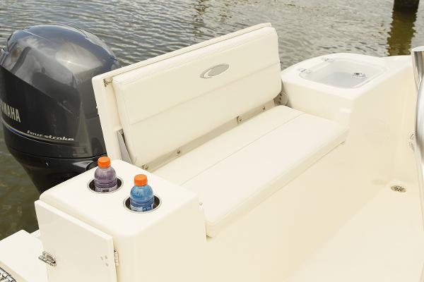 Manufacturer Provided Image: 2018 Cobia 201 Center Console boat with Yamaha outboard motor and seating area.