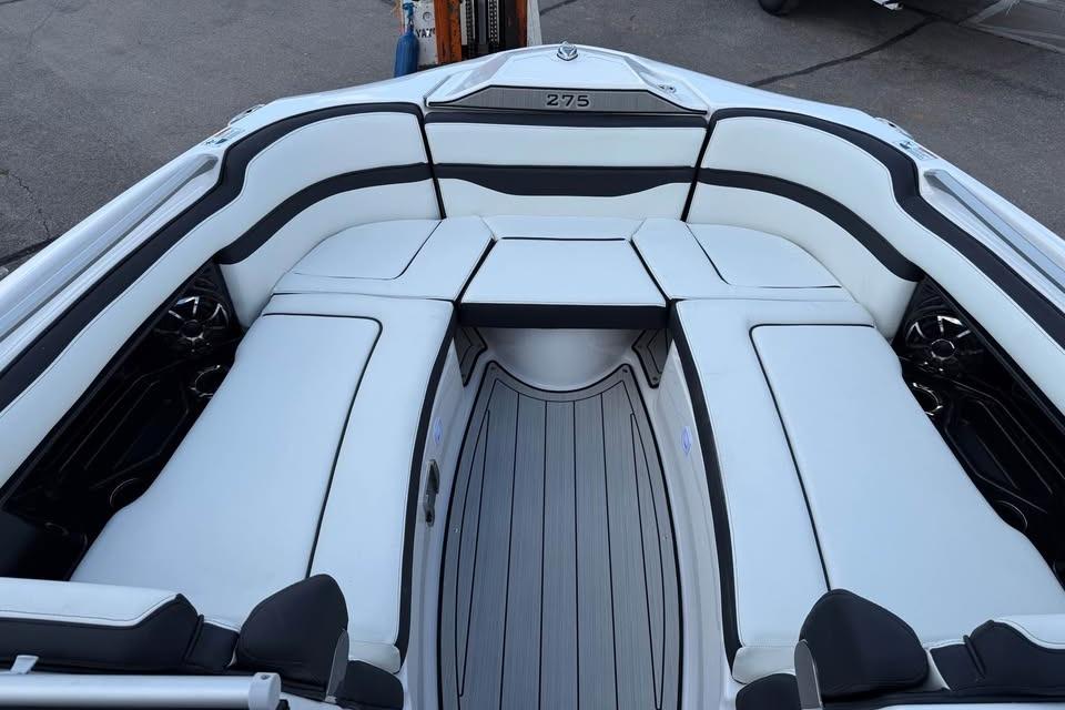 2026 Yamaha Boats 275SD interior with sleek white seating and modern design.