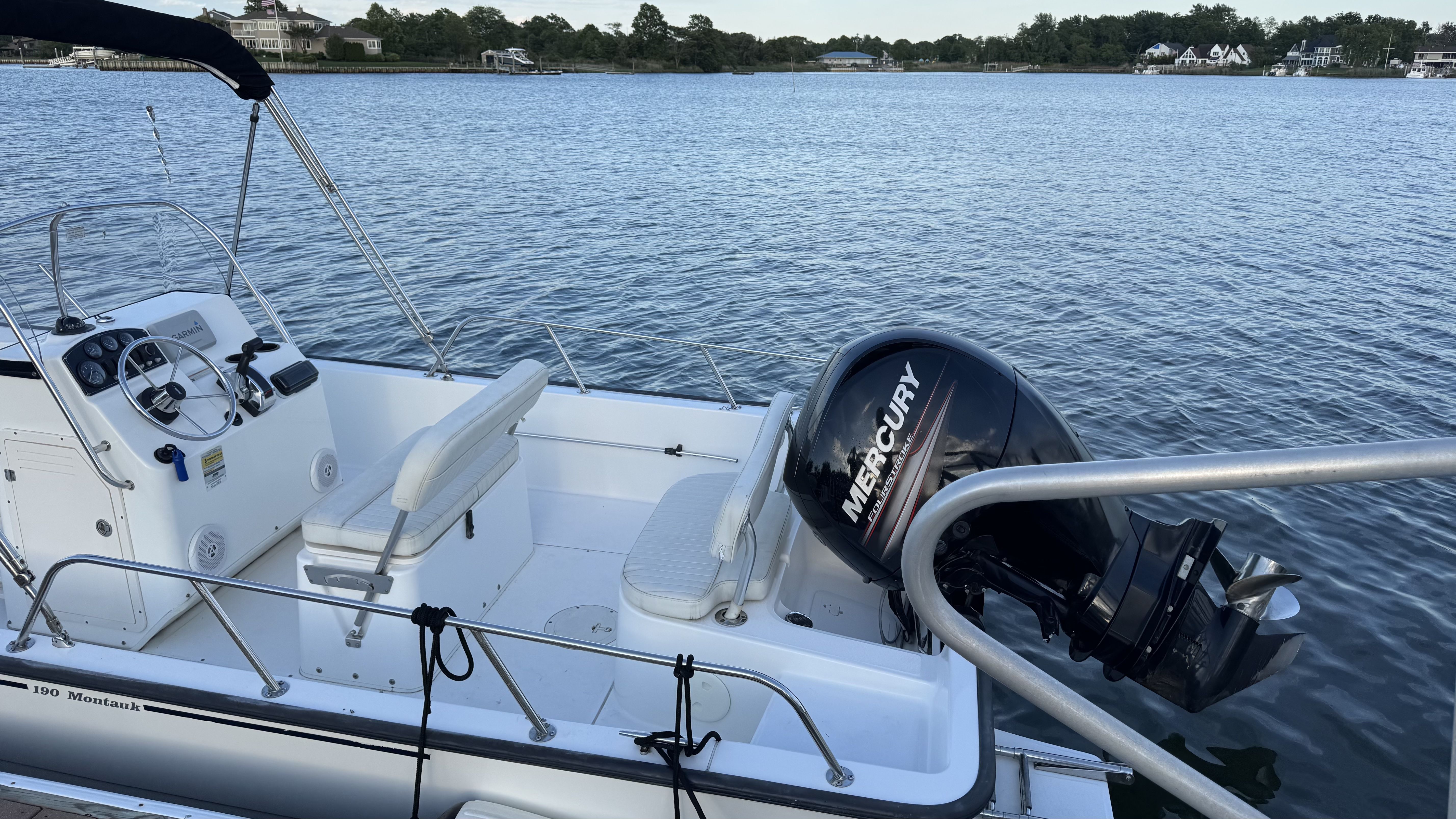 2007 Boston Whaler 190 Montauk boat on calm water.