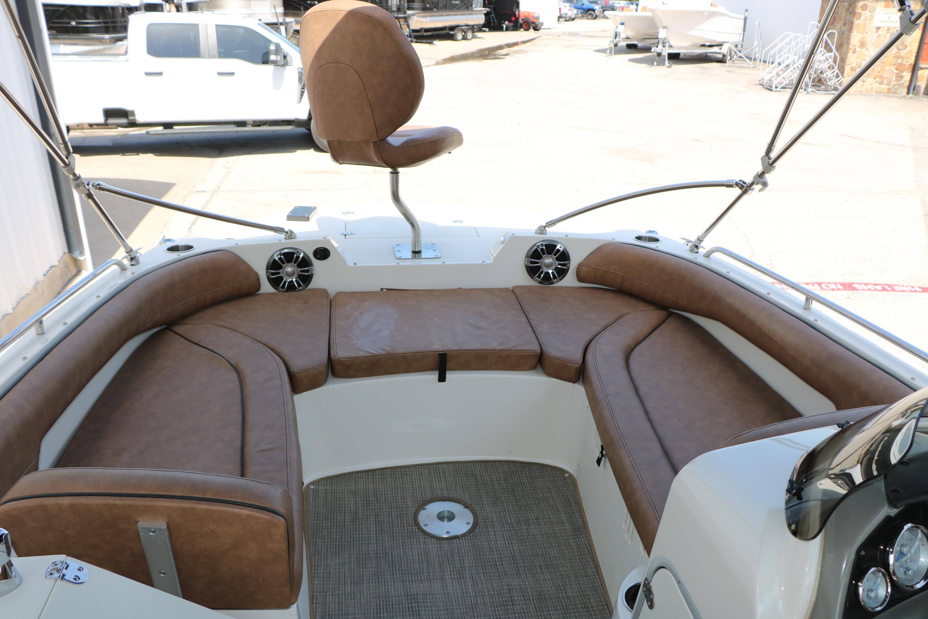 2022 Stingray 192 SC boat interior with brown seating and modern design.