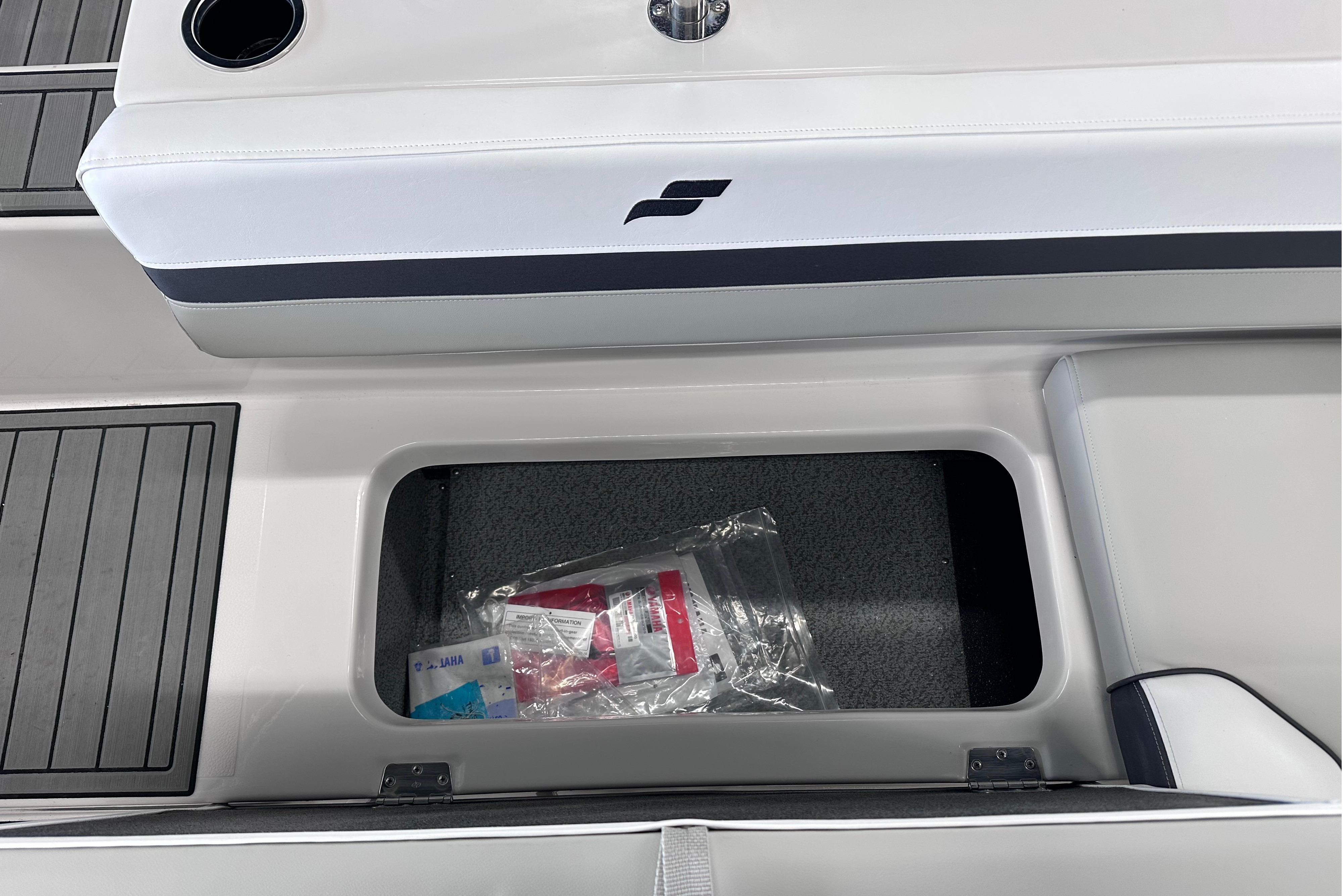 2026 Starcraft SVX 191 OB boat interior storage compartment with packaging inside.