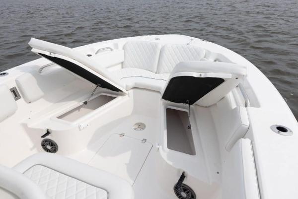 Manufacturer Provided Image: 2025 Sea Fox 248 Commander boat with open storage compartments on calm water.