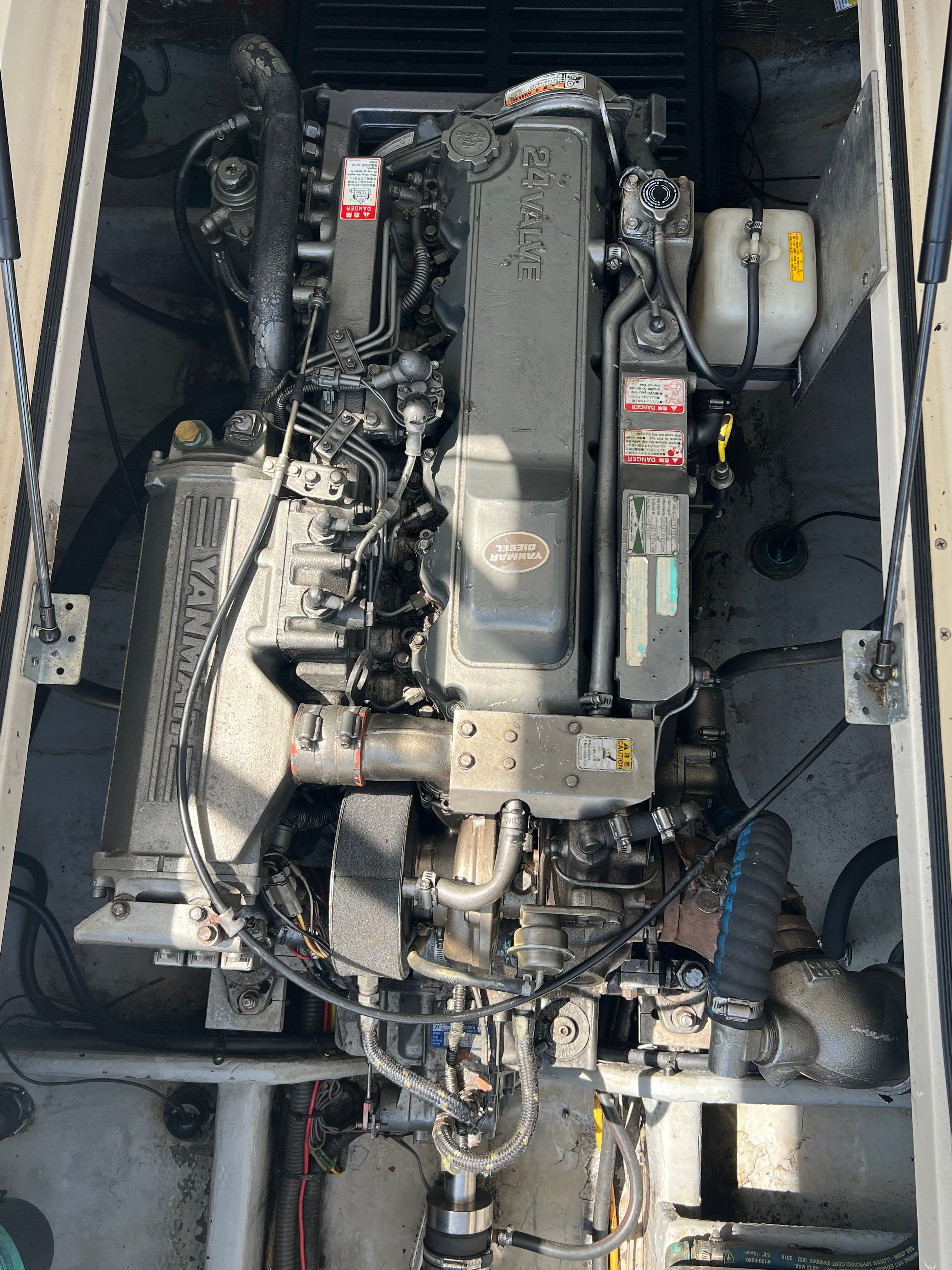 Engine compartment of a 2003 Mainship Pilot 30-II boat.