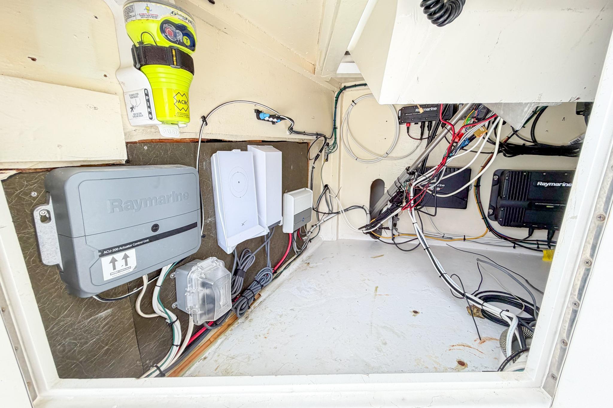 Electrical compartment of a 1998 Blackwell Custom Carolina Sportfish boat with Raymarine equipment.