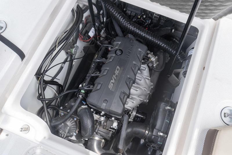 Engine compartment of 2023 Yamaha Boats 195 FSH Sport, showcasing SVHO engine details.