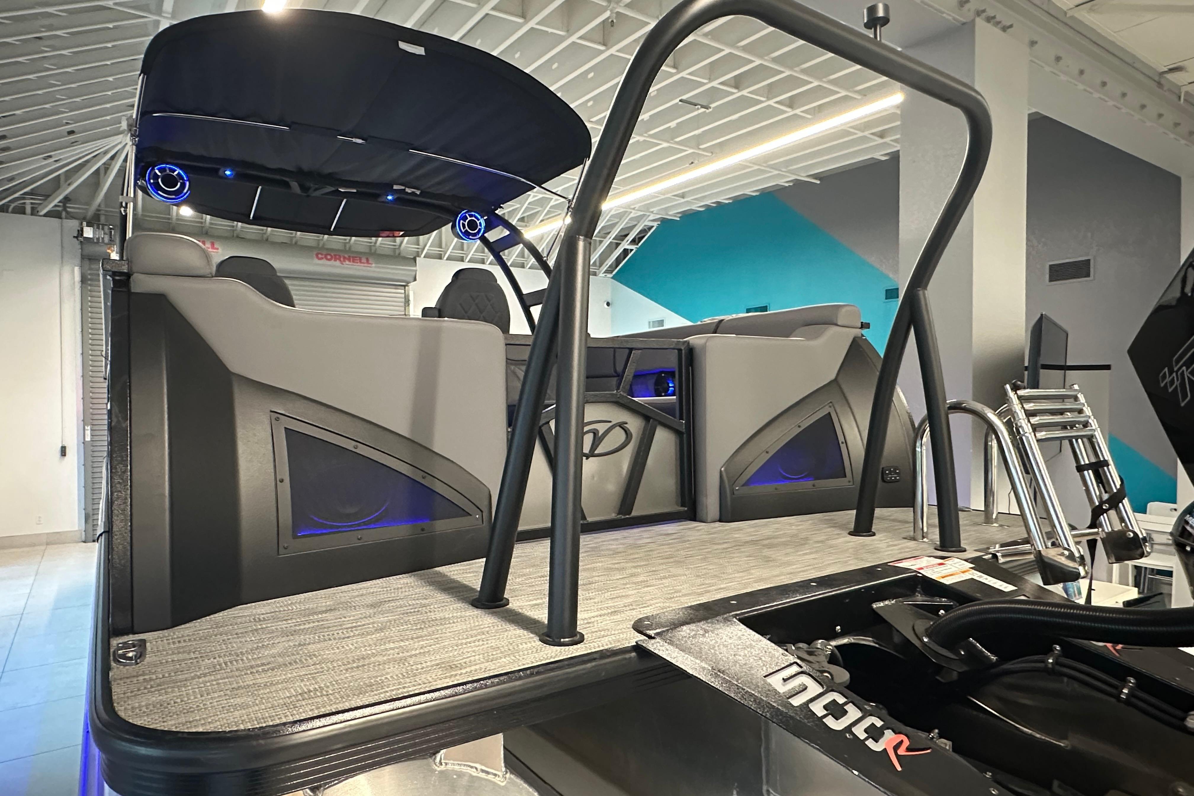 2025 Veranda VX 27 DCRC pontoon boat interior with modern design and blue LED lighting.