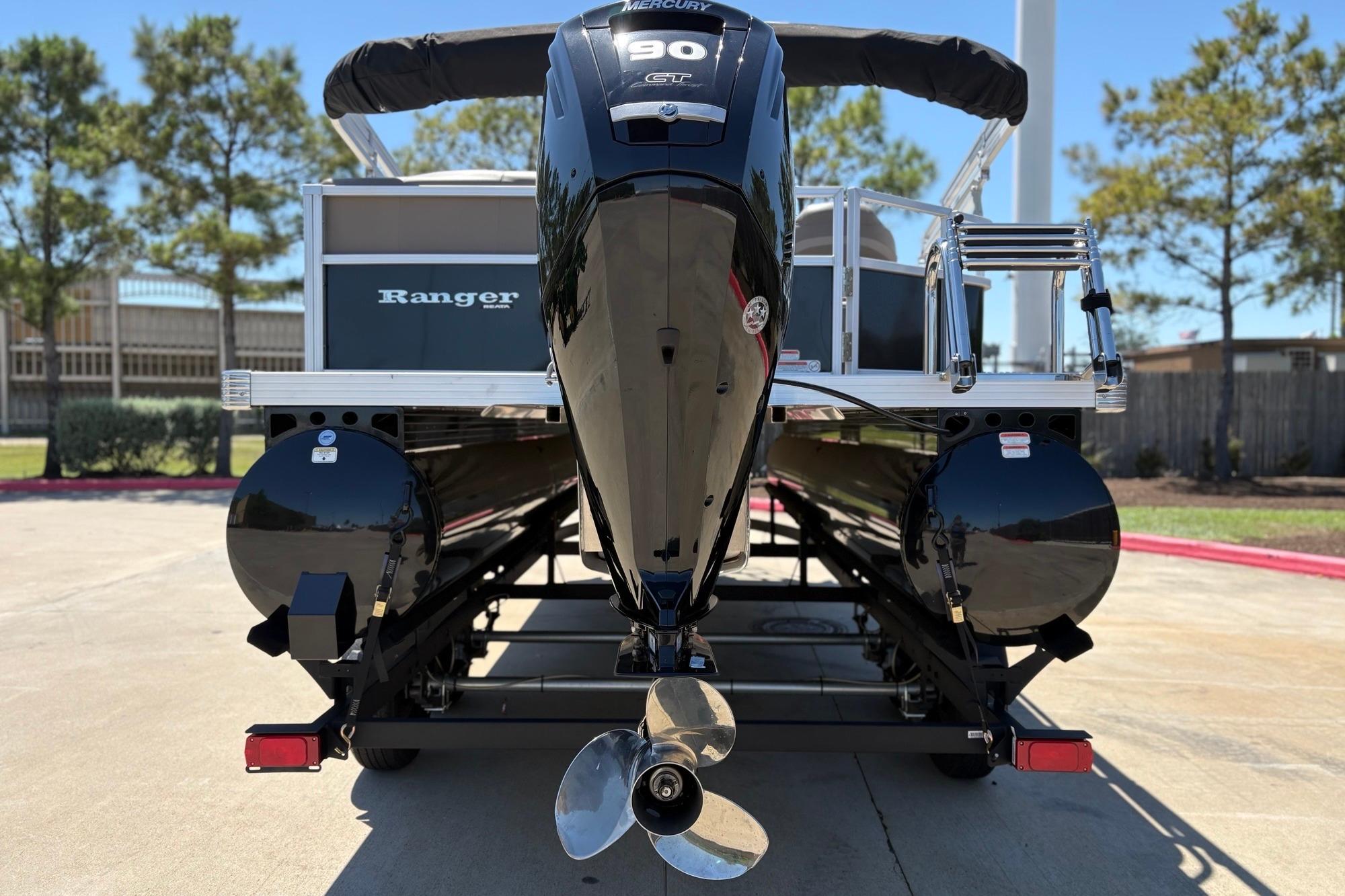 2024 Ranger Reata 200C pontoon boat with Mercury 90 HP engine, rear view.