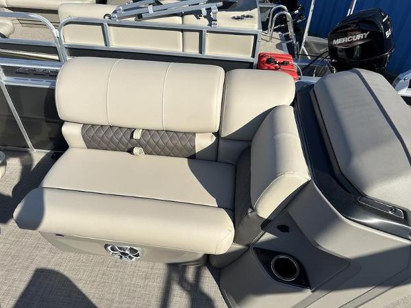2025 Sun Tracker FB 20 DLX boat interior with beige seating and modern design.