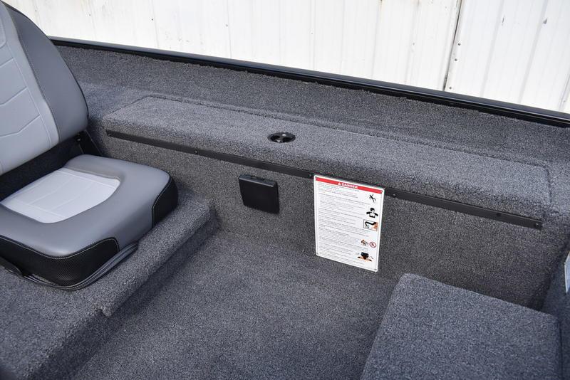 2026 Lowe Skorpion 17 boat interior with gray seating and carpeted flooring.