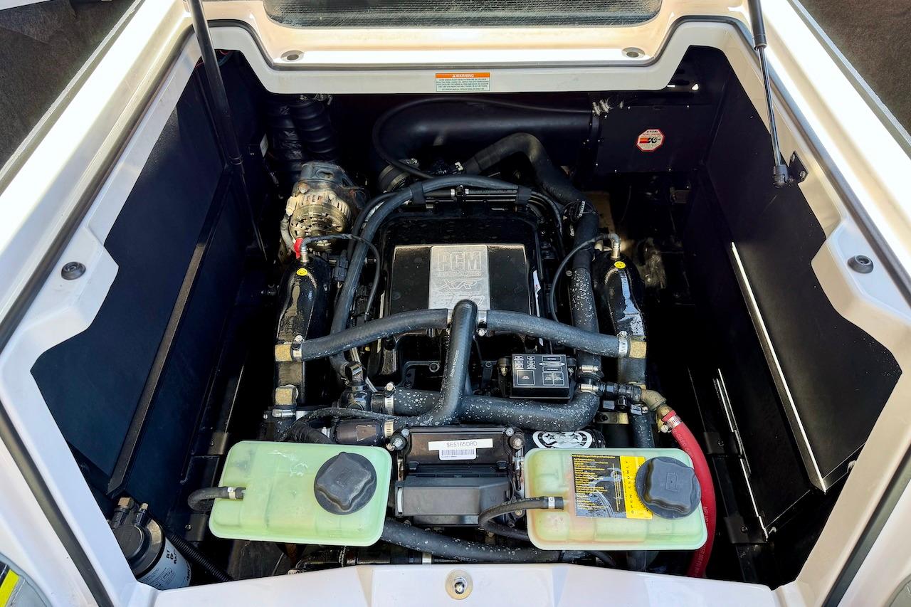 Engine compartment of a 2014 Nautique Super Air Nautique G21 boat.