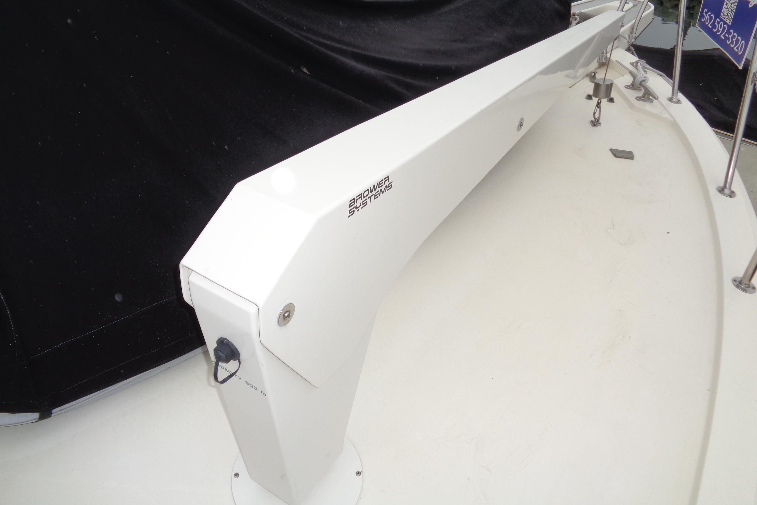 1981 Hatteras 48 Cockpit Motor Yacht deck with davit system.