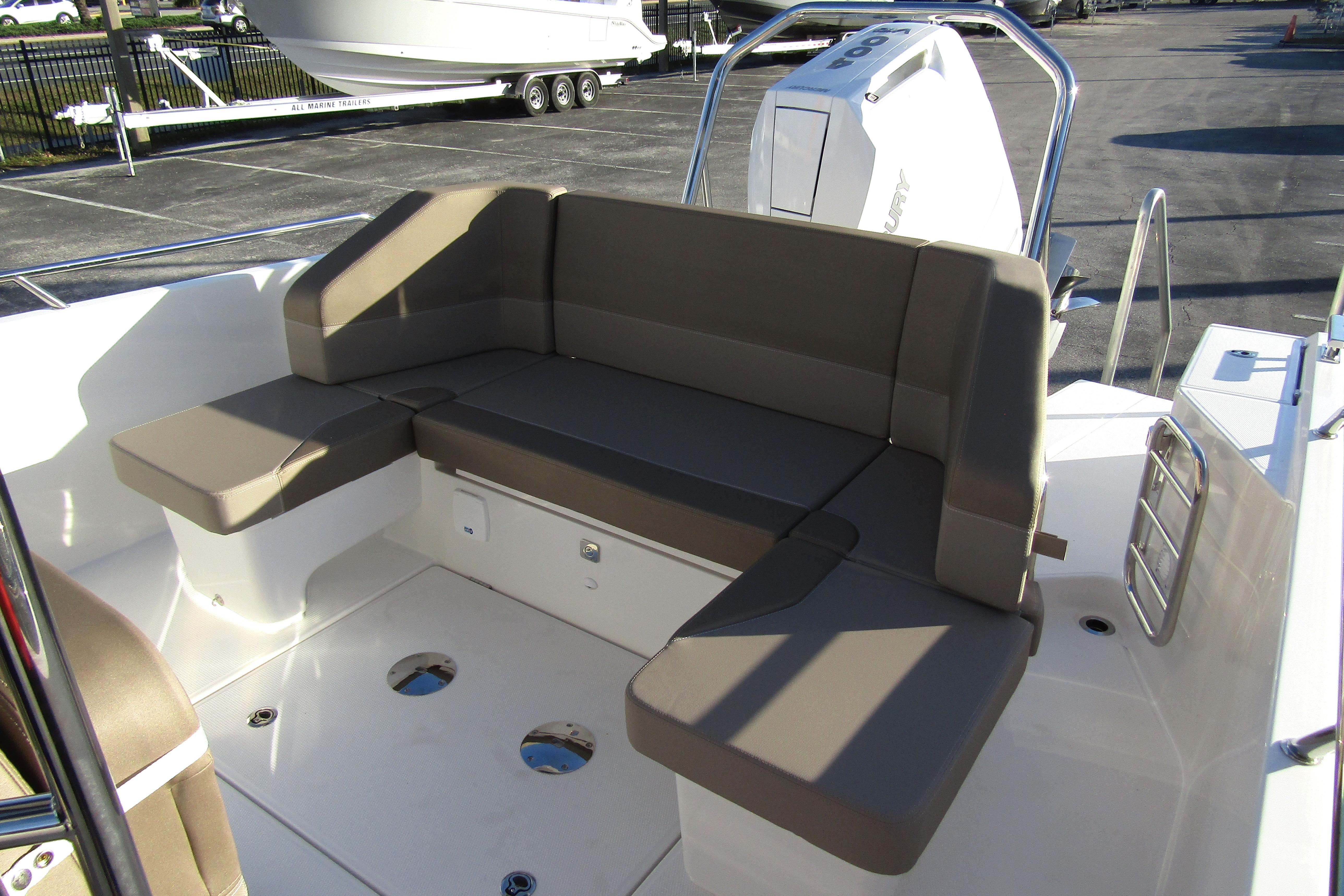 2025 Nimbus Tender 9 boat interior with cushioned seating and modern design.