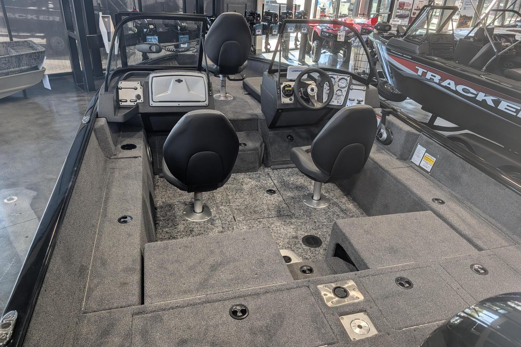 2026 Tracker Pro Guide V-175 Combo boat interior with seating and control panel.