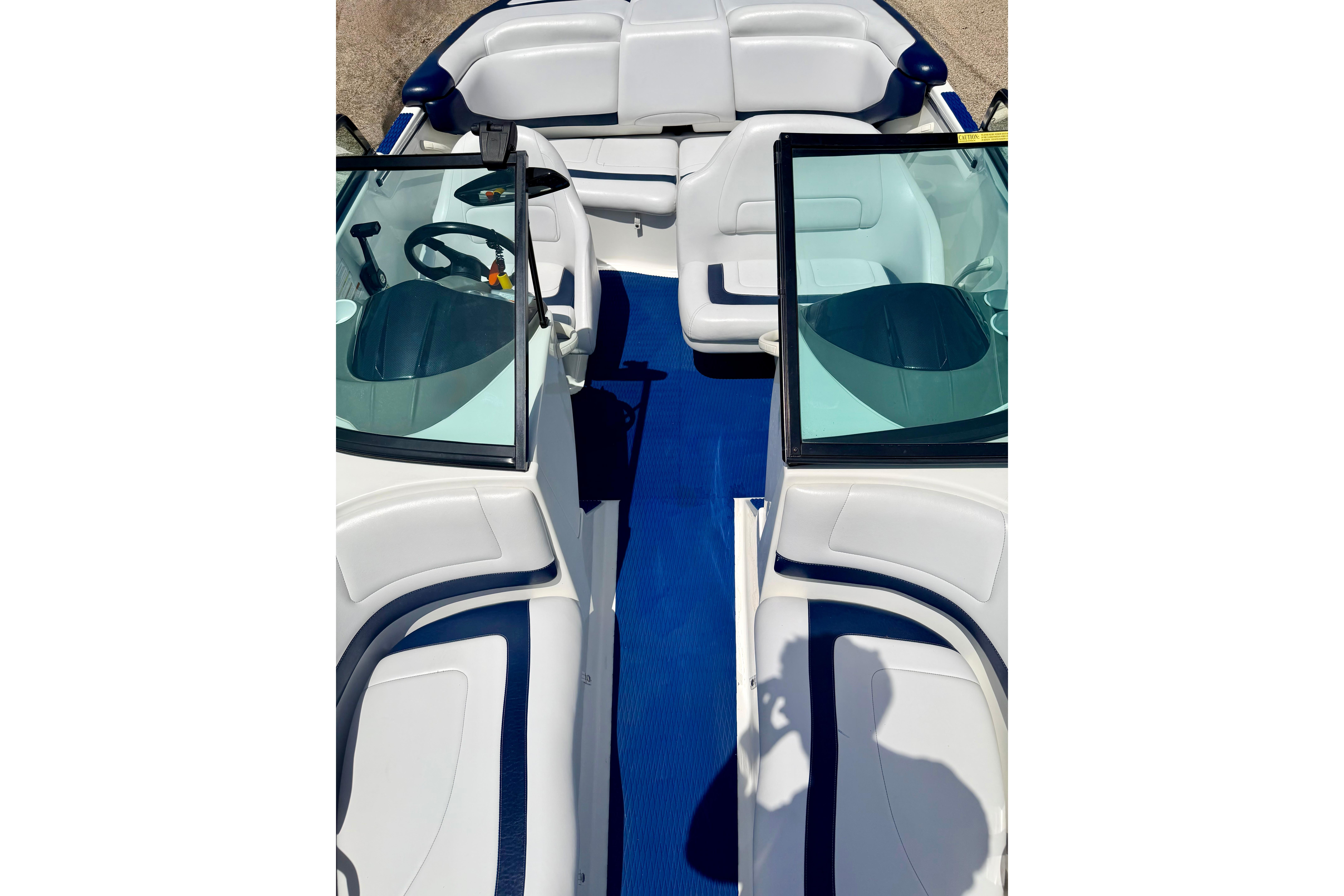 2004 Bombardier SEADOO Utopia 185 boat interior with blue and white seating.