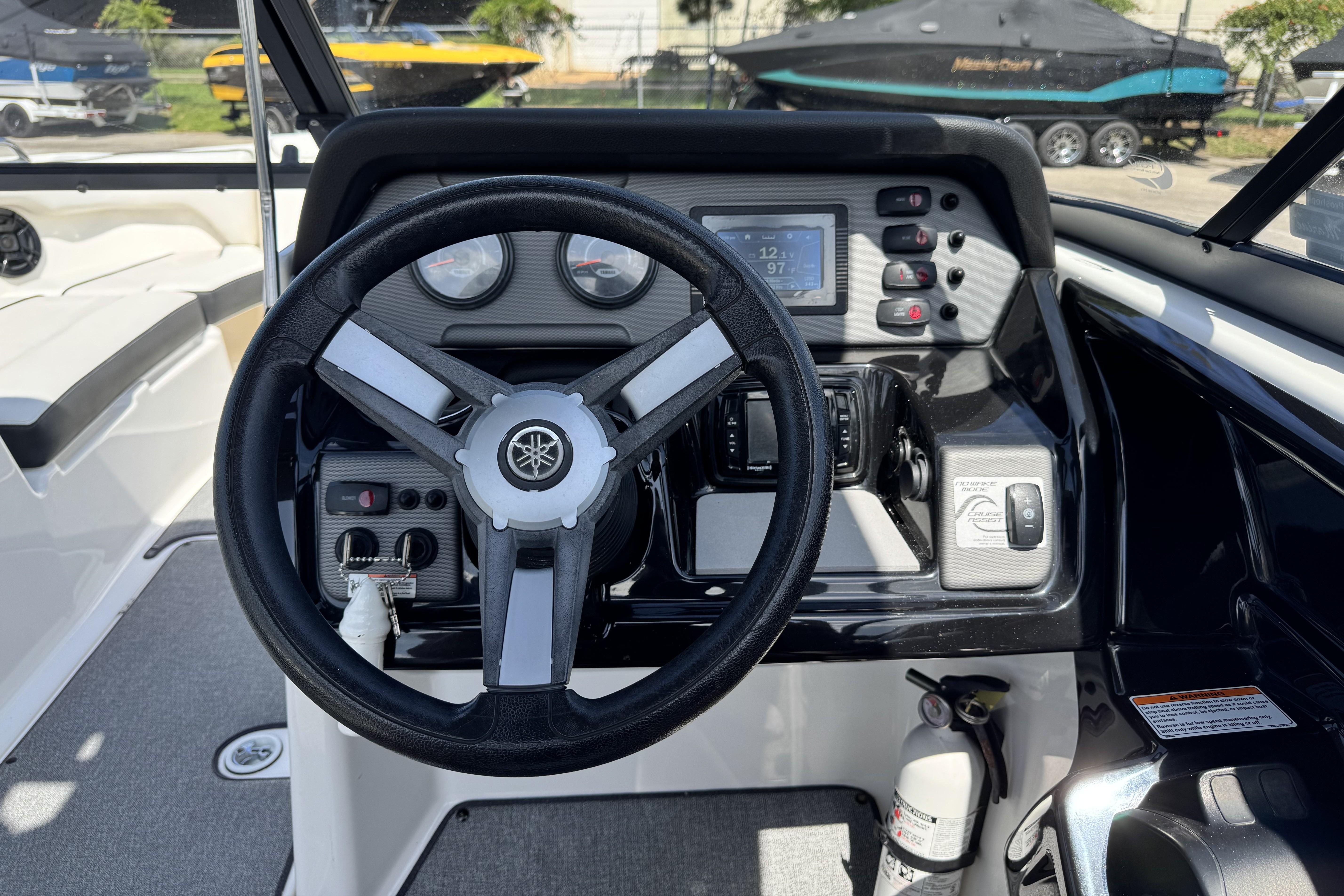 2018 Yamaha Boats AR210 dashboard with steering wheel, gauges, and controls.