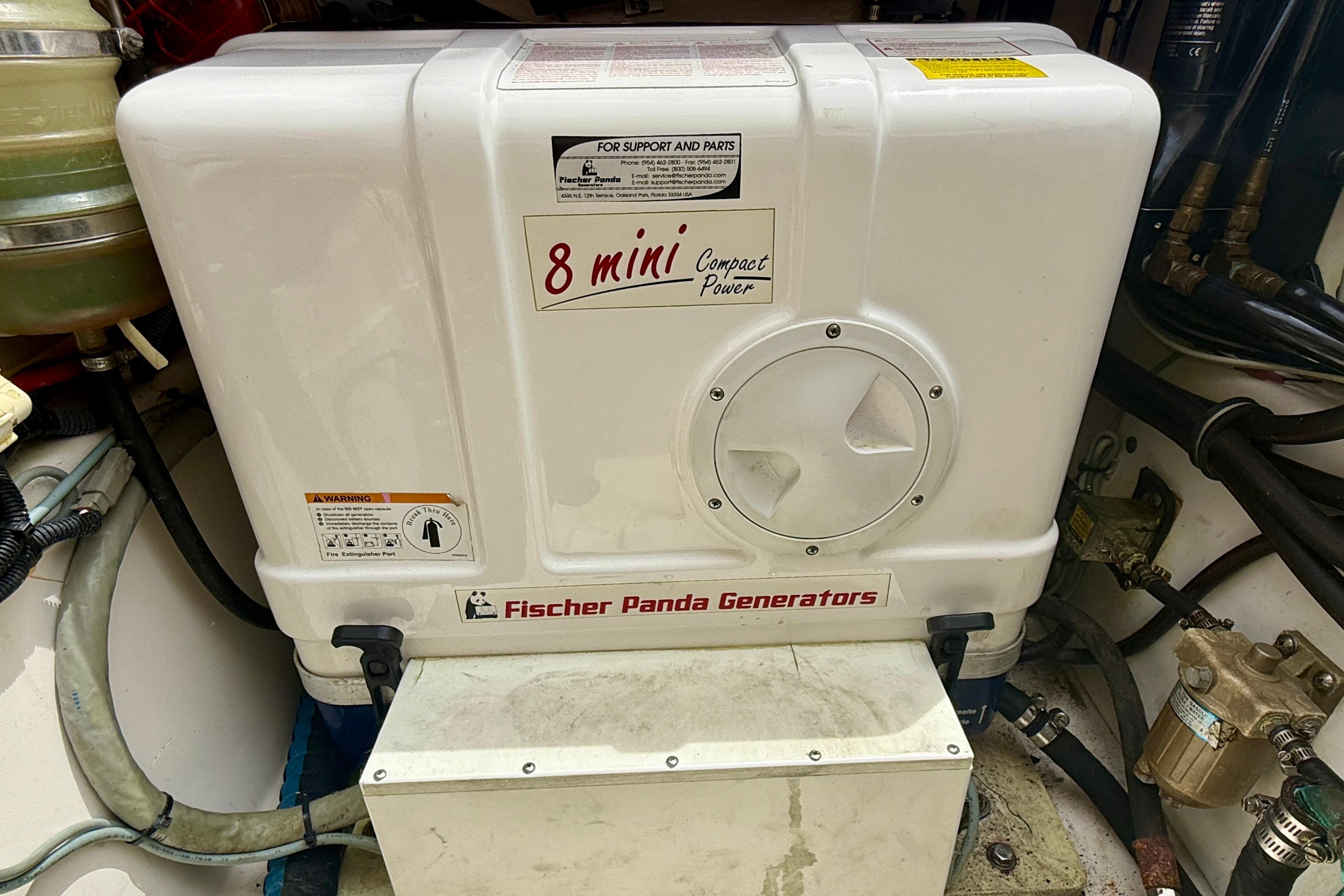 Fischer Panda generator in a 2012 Pursuit OS 345 Offshore boat engine room.