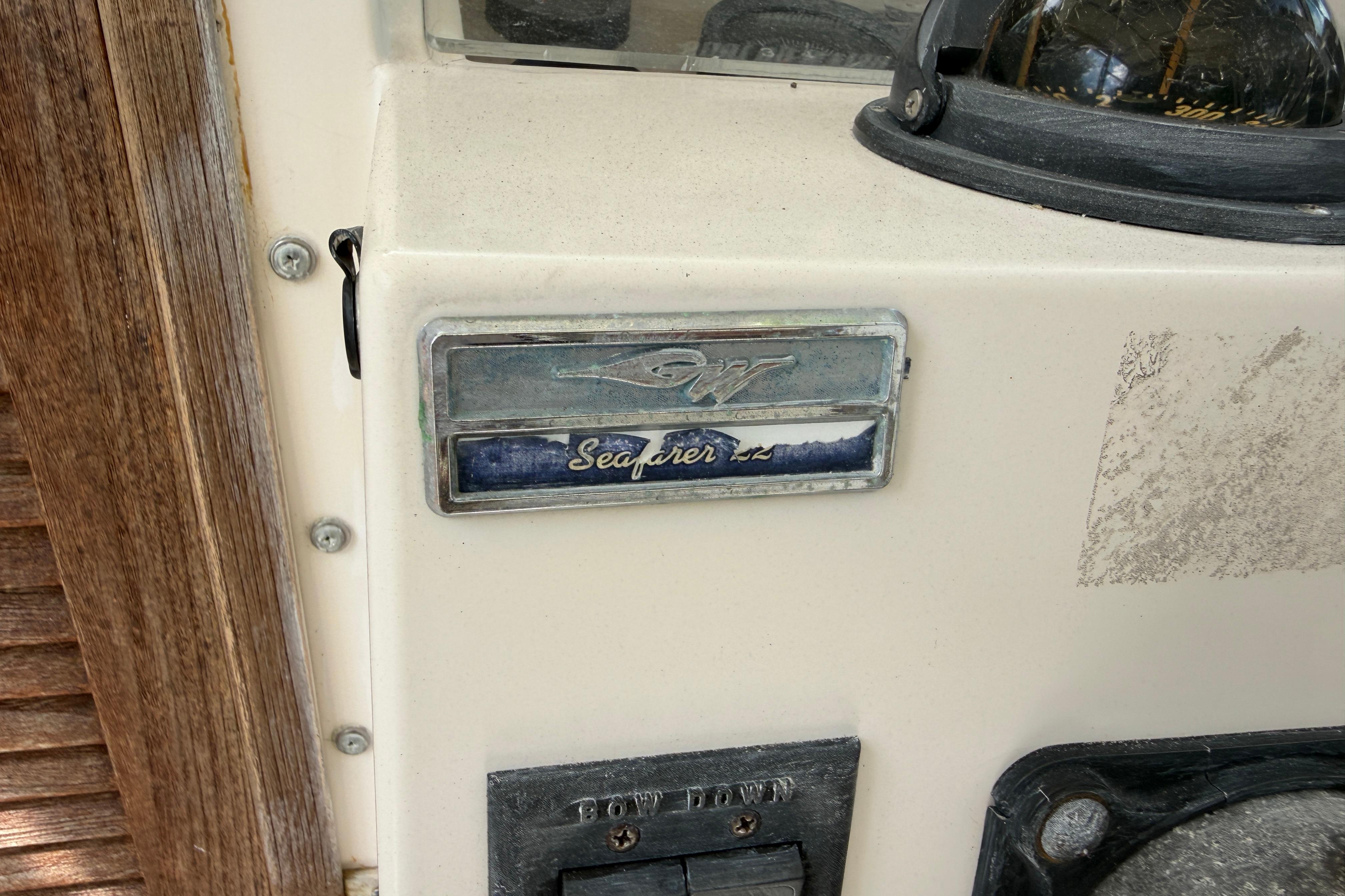 1987 Grady-White Seafarer 226 boat emblem and control panel detail.