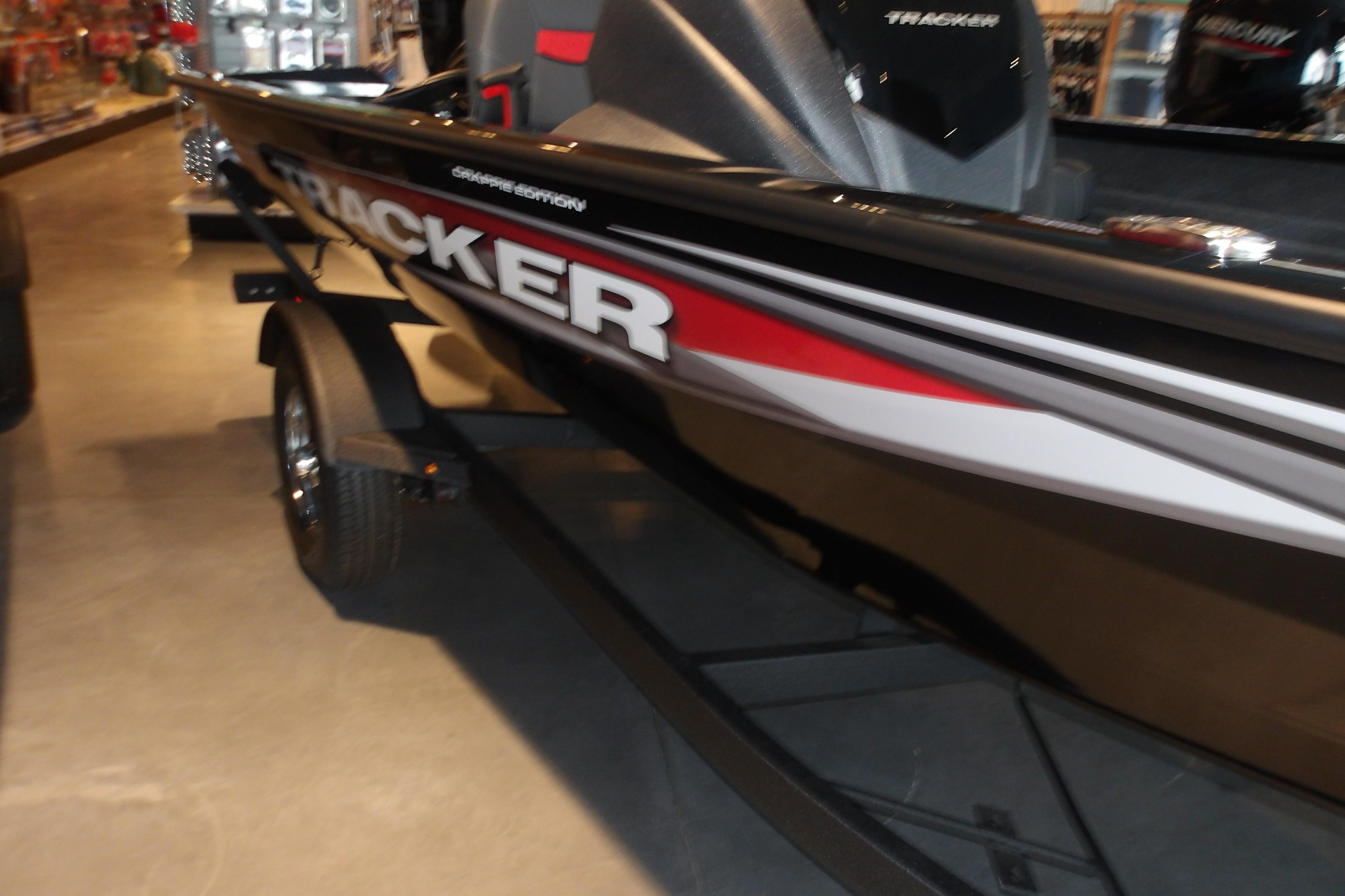 2026 Tracker Pro Team 175 Crappie Edition boat on display in showroom.