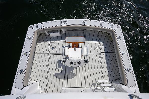 Top view of 2000 Viking 50 Convertible yacht deck with fishing chair.