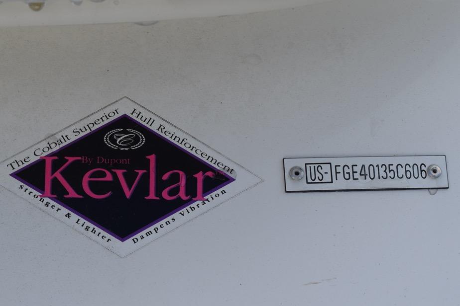 2006 Cobalt 240 boat hull with Kevlar reinforcement label and serial number plate.