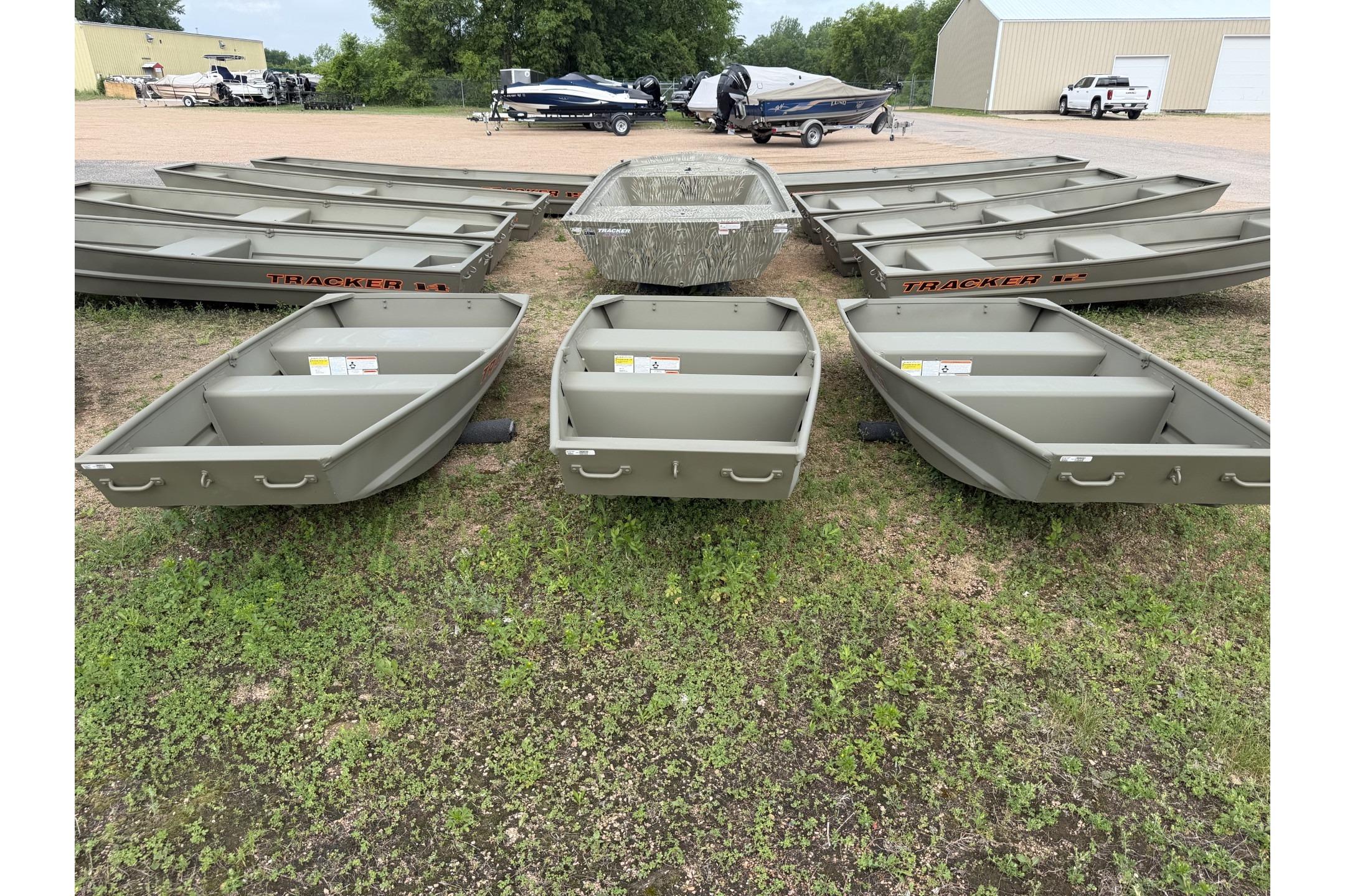 2026 Tracker Grizzly 10 Jon boats displayed outdoors on grass.