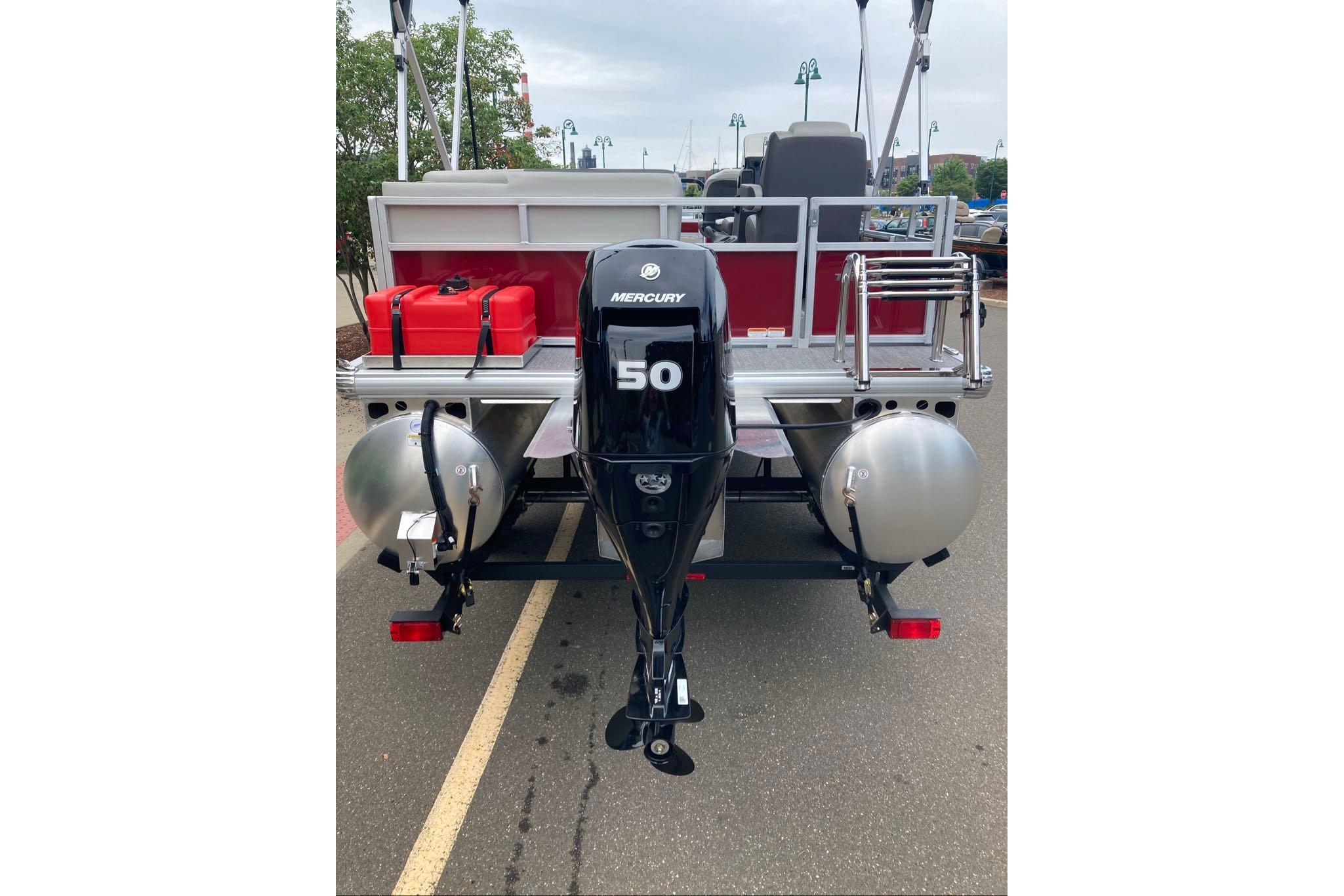 2026 Sun Tracker Bass Buggy 16 XL Select pontoon boat with Mercury 50 engine.