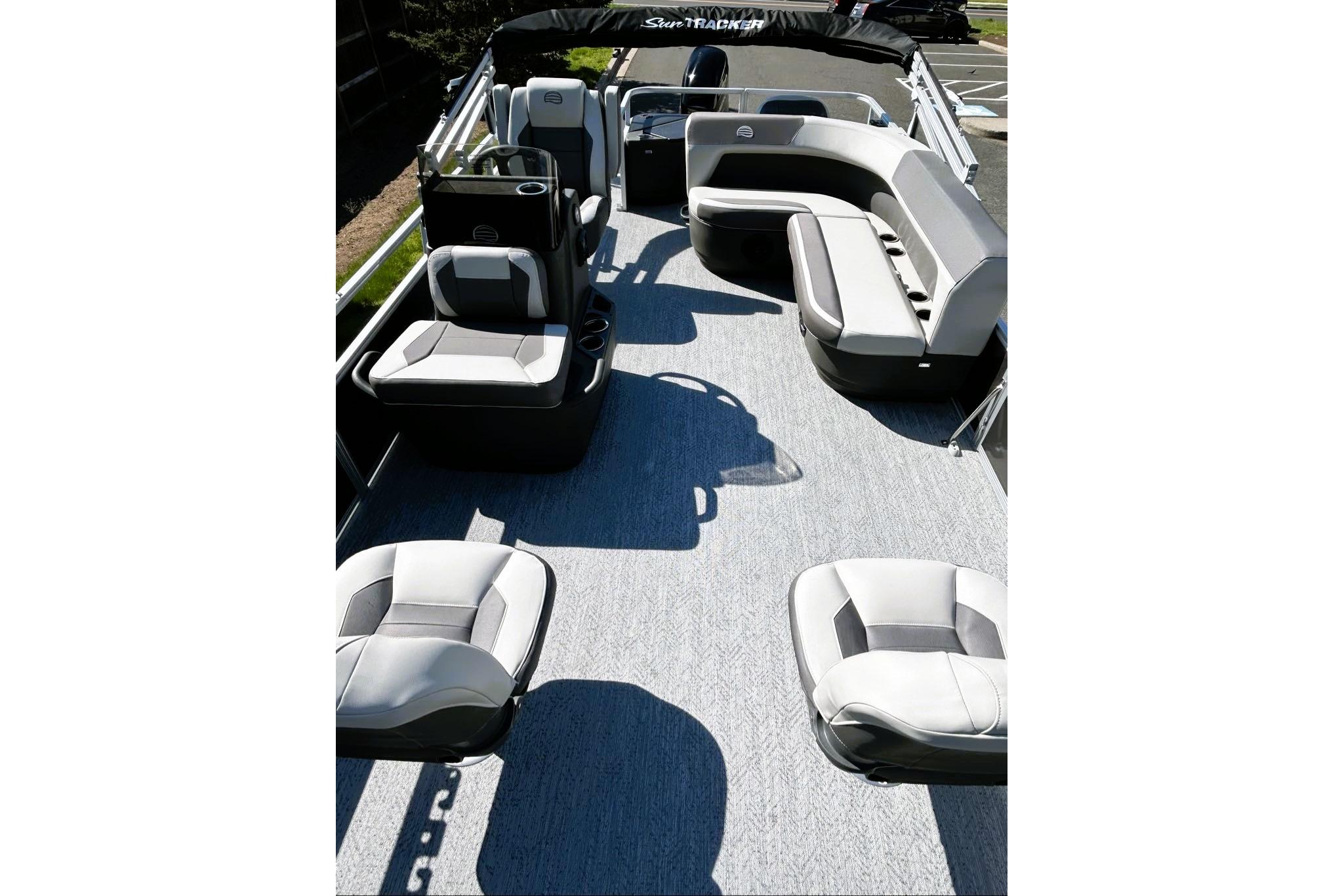 2026 Sun Tracker Bass Buggy 18 DLX pontoon boat interior with spacious seating.