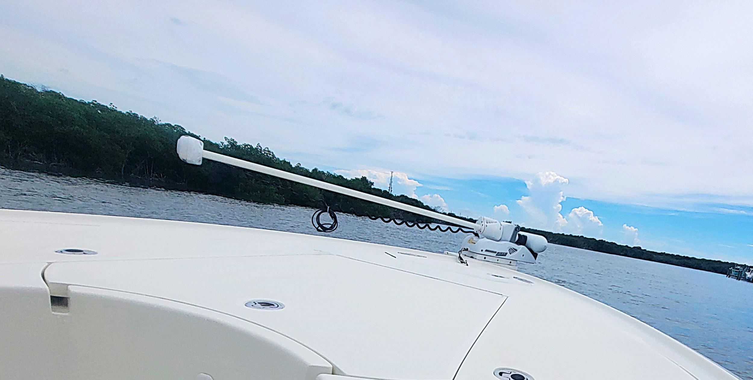 2017 SeaVee 270Z boat on calm water under a partly cloudy sky.