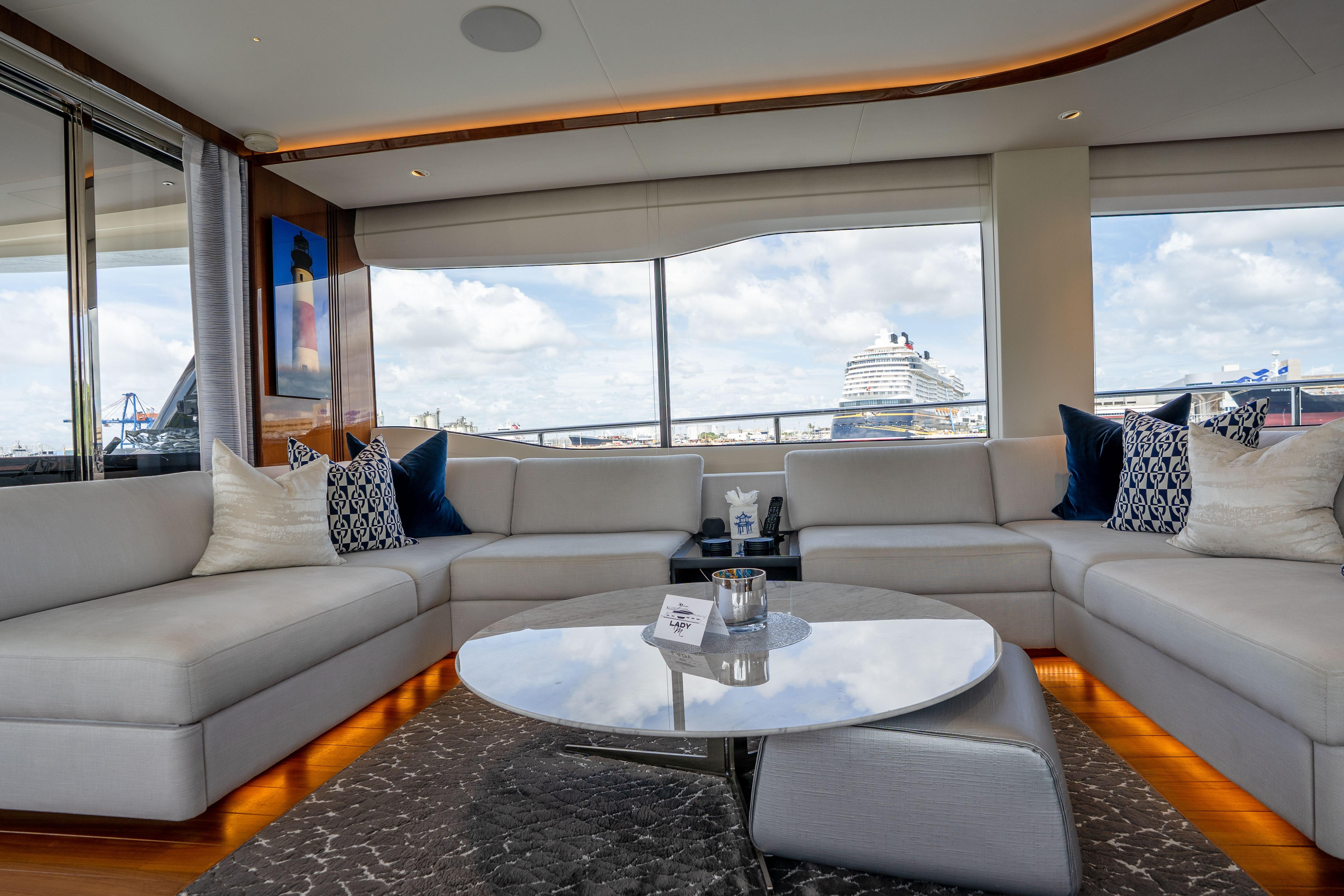Luxurious interior of 2020 Princess Y85 yacht with elegant seating and ocean view.