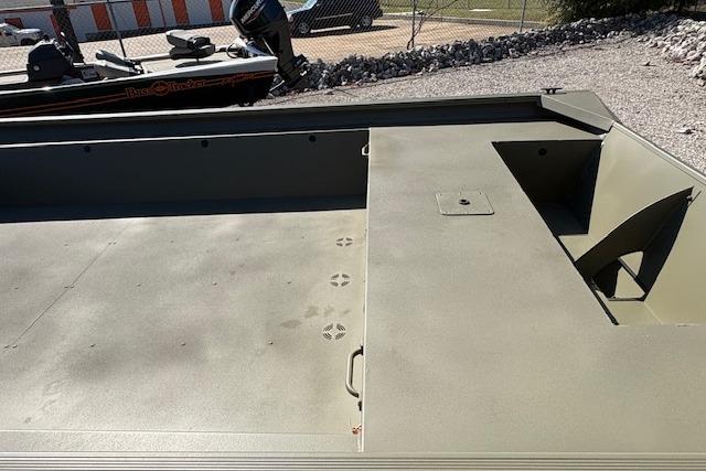 2026 Tracker Grizzly 1860 Utility boat interior with paw prints on deck.