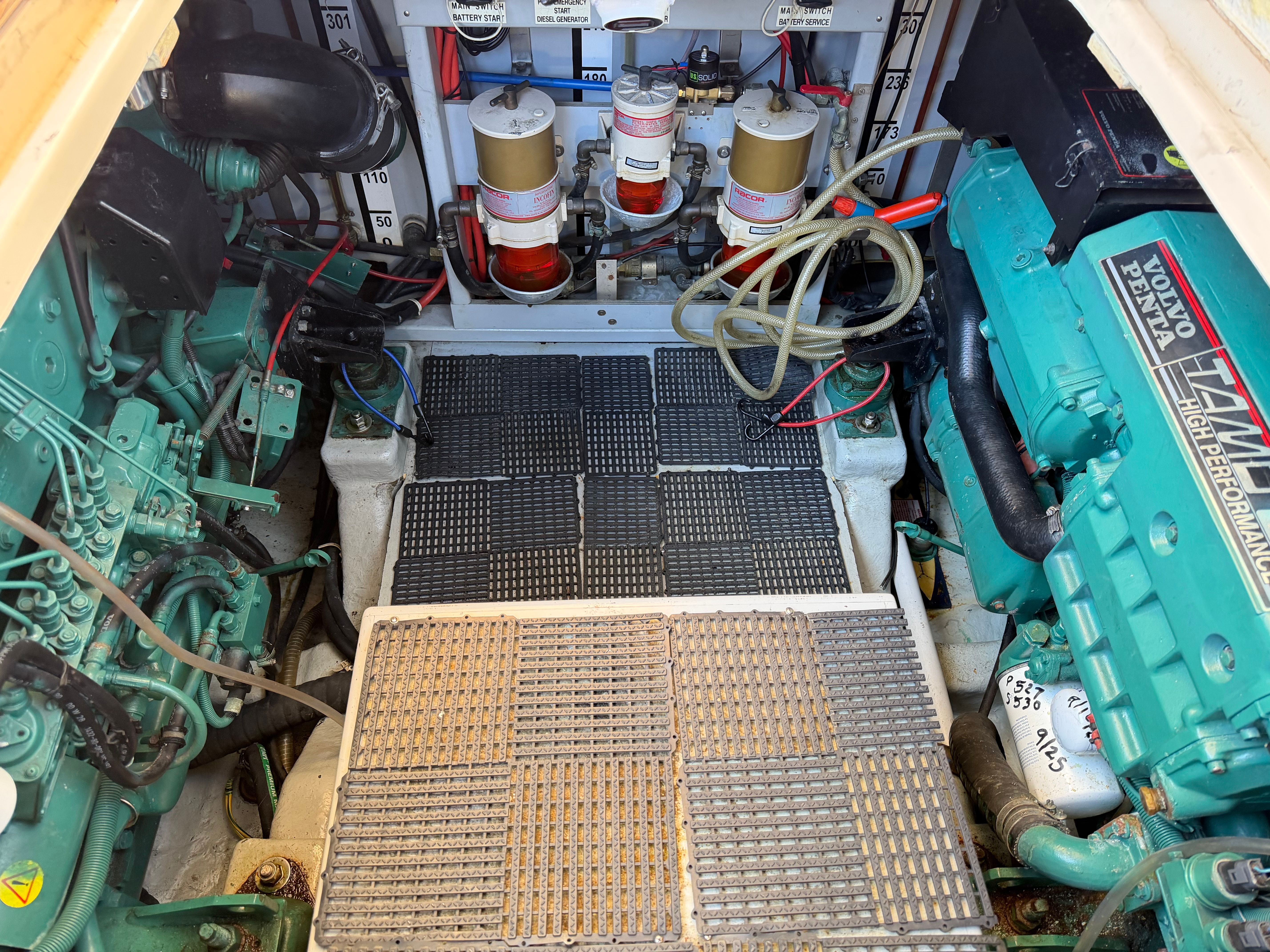 Engine room of a 2003 Apreamare 11 boat with Volvo Penta engines.