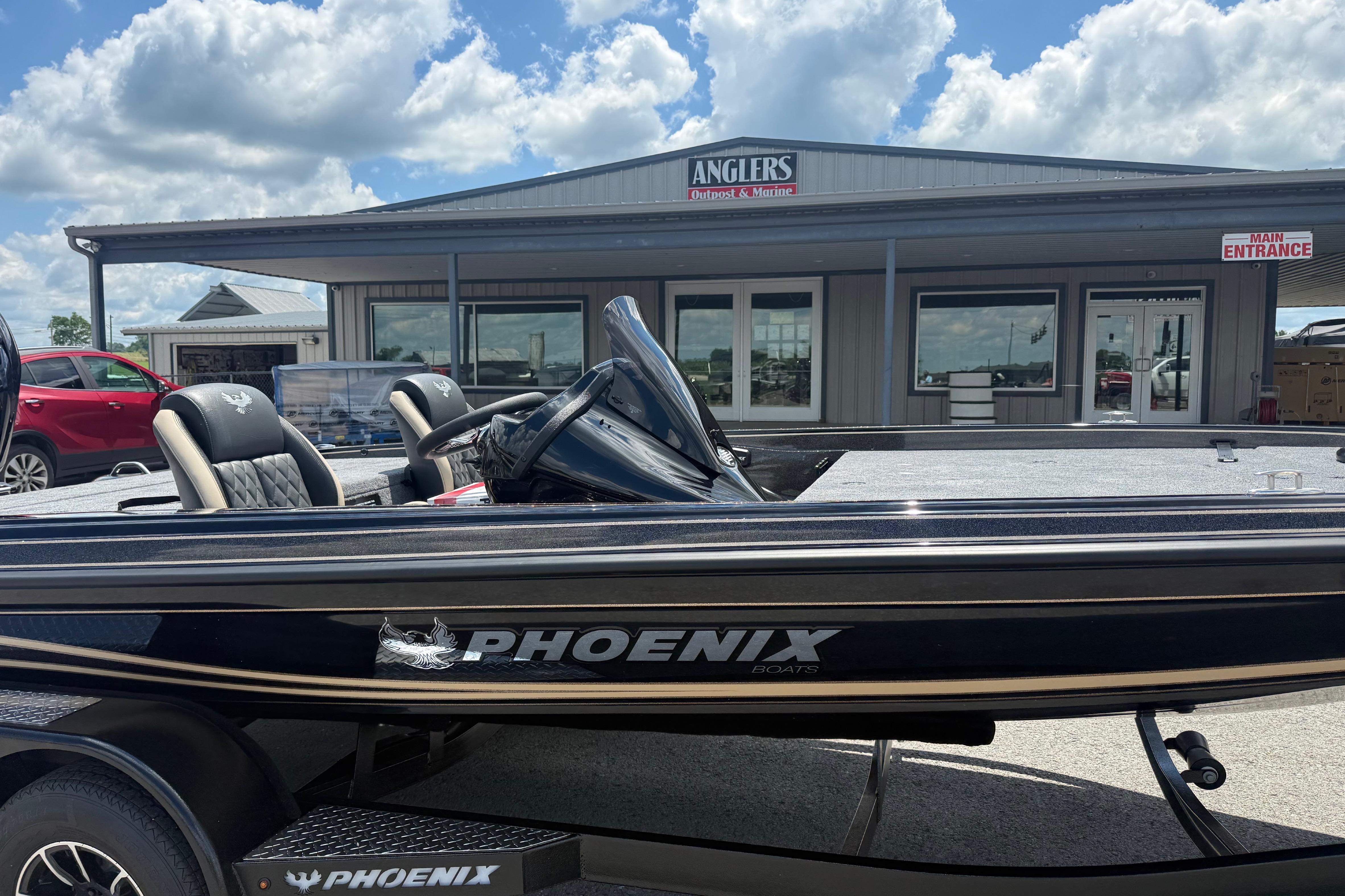 2027 Phoenix 721 ZXL boat parked outside Anglers Outpost & Marine.