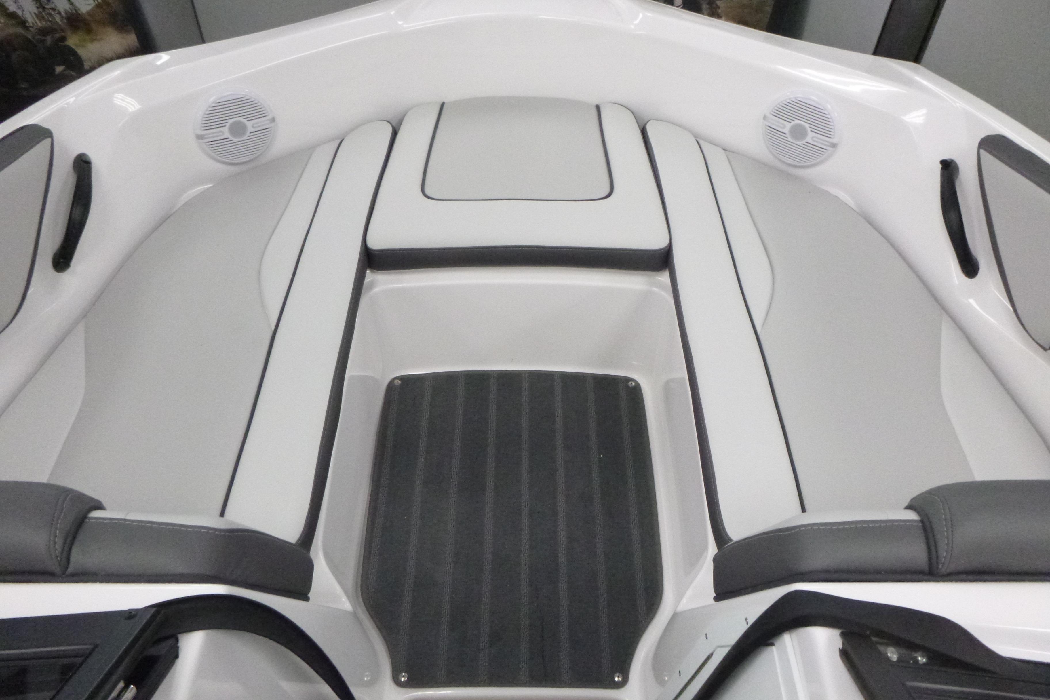 2026 Yamaha AR190 boat interior with cushioned seating and built-in speakers.