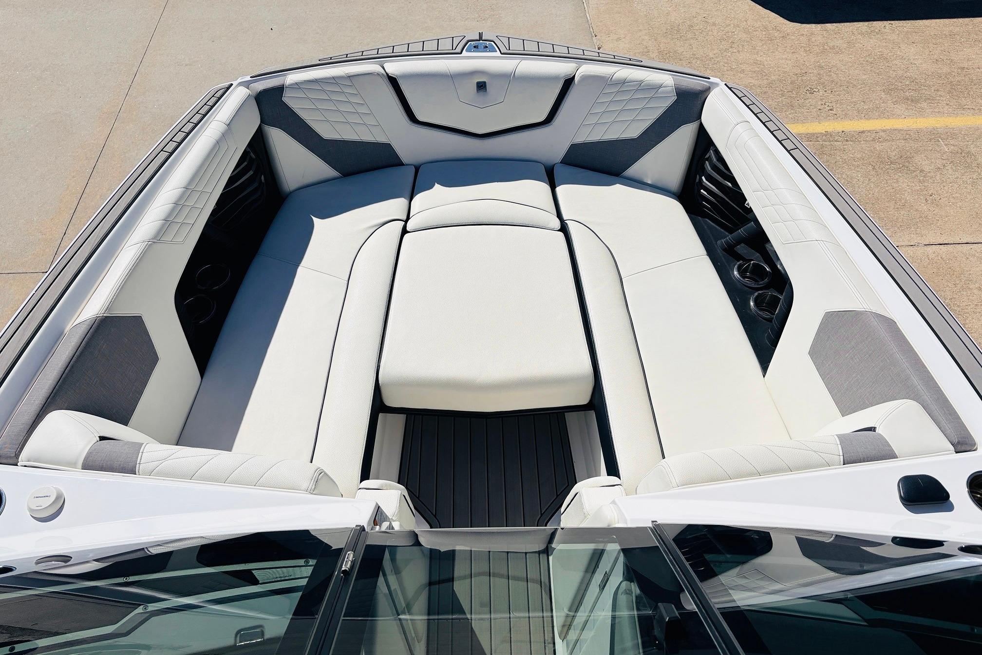 2023 Nautique Super Air Nautique G25 boat interior with luxurious seating and modern design.
