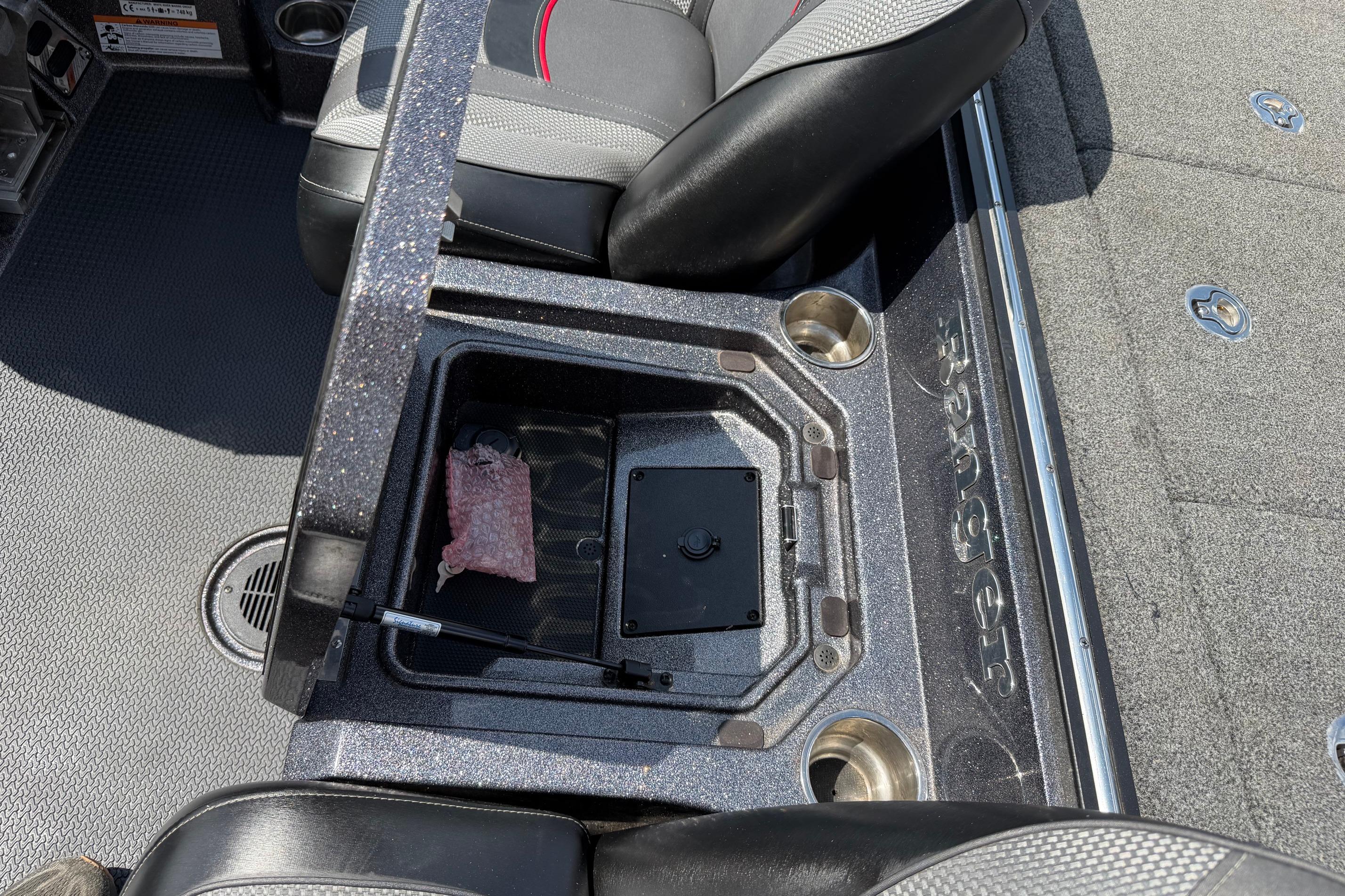 2020 Ranger Z520L boat interior with storage compartment and seating.