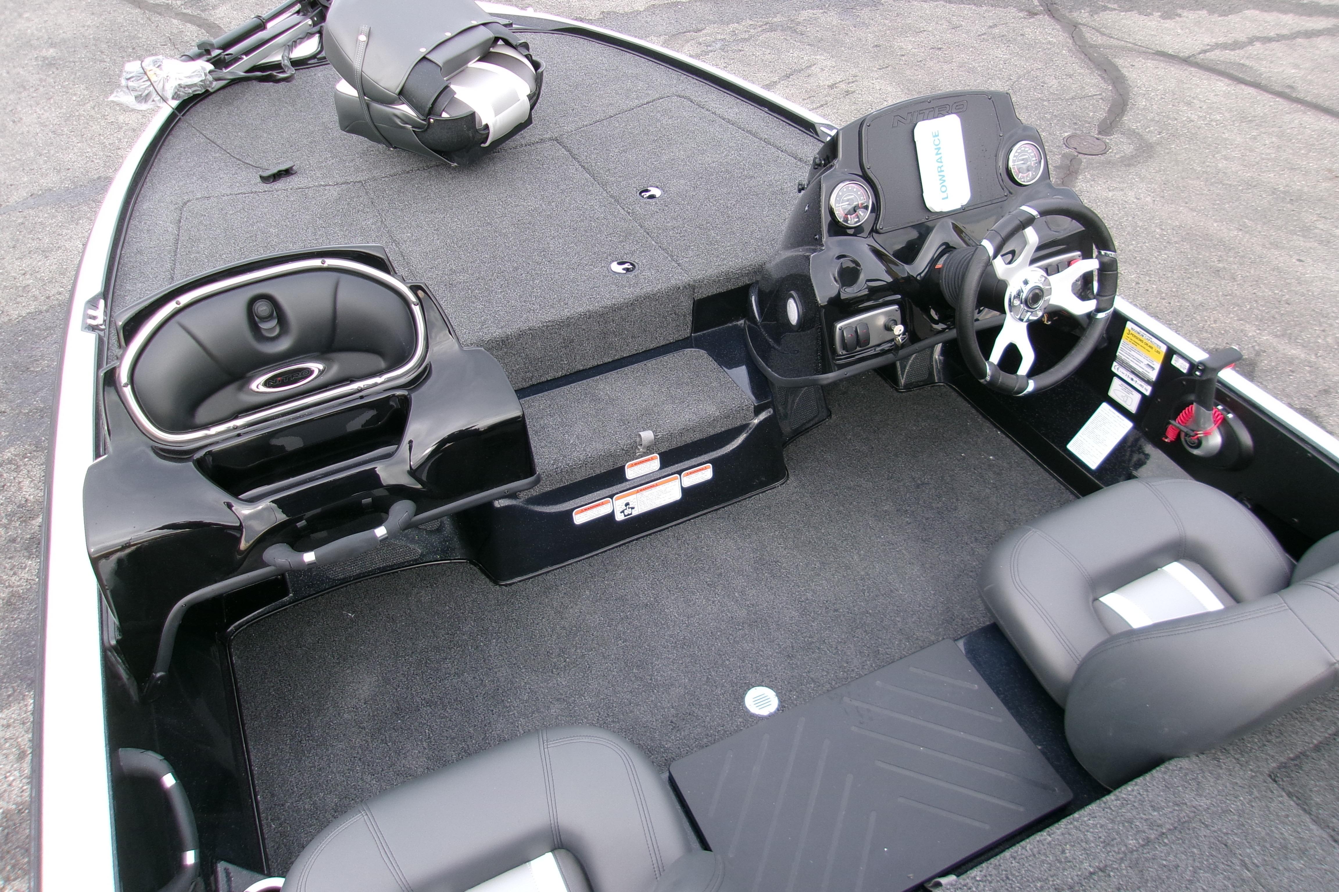 2026 Nitro Z17 boat interior with steering console and seating.