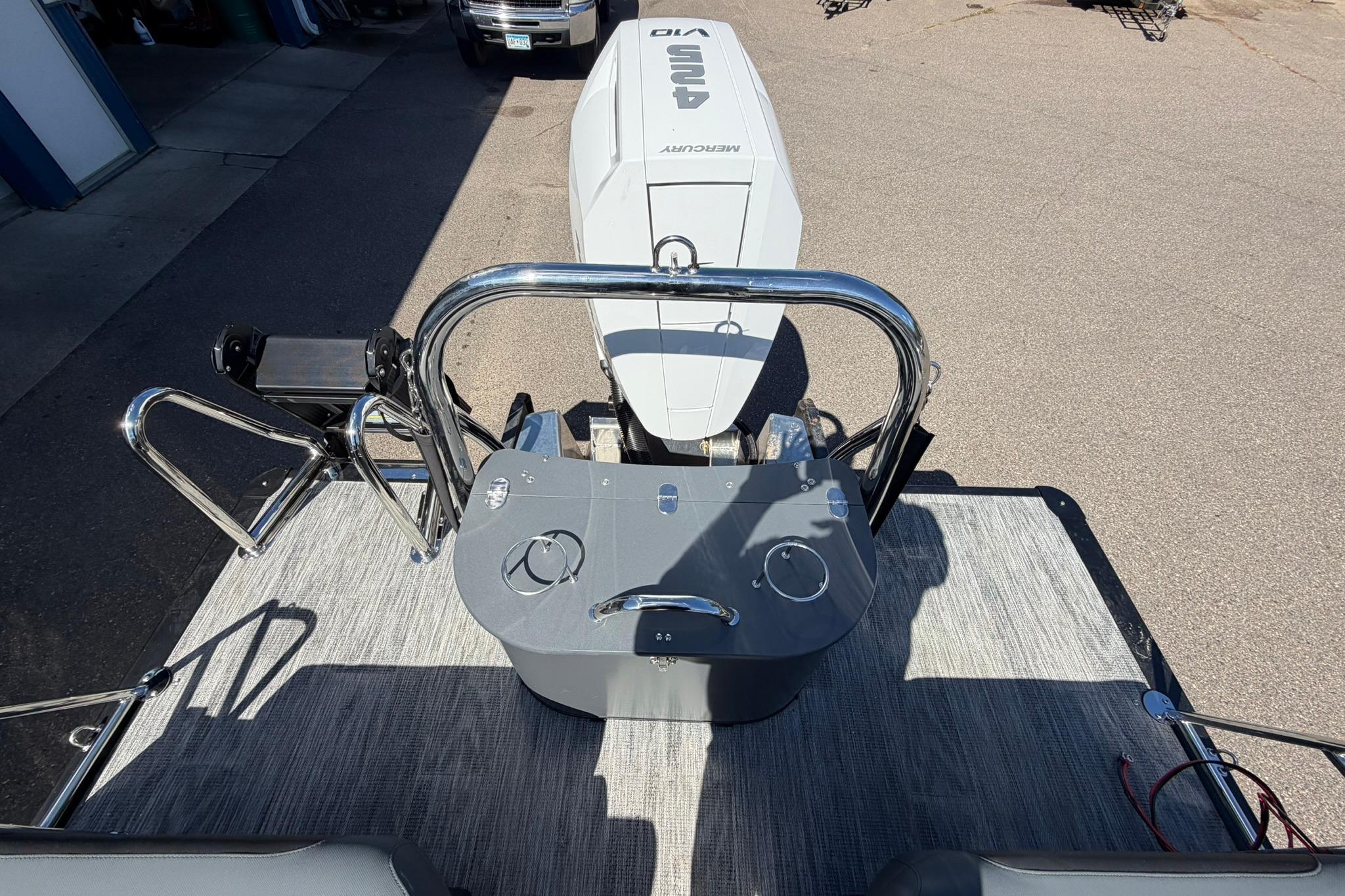 2026 Avalon Excalibur LTD Quad Lounge boat with Mercury engine, rear deck view.