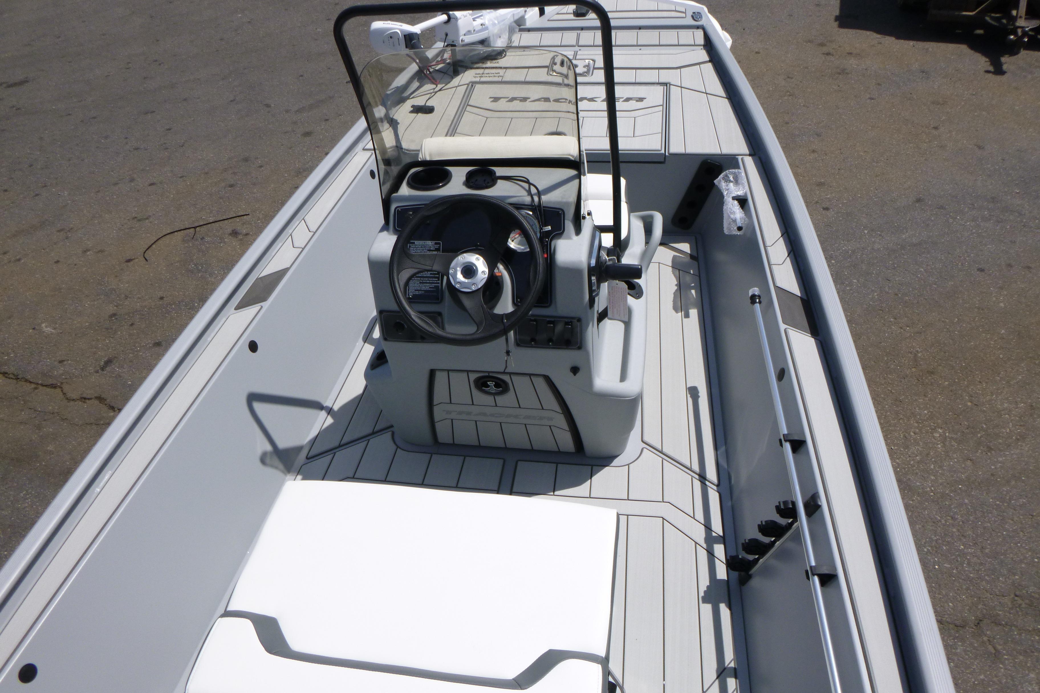 2026 Tracker Bass Tracker Classic CC boat interior with steering console and seating.