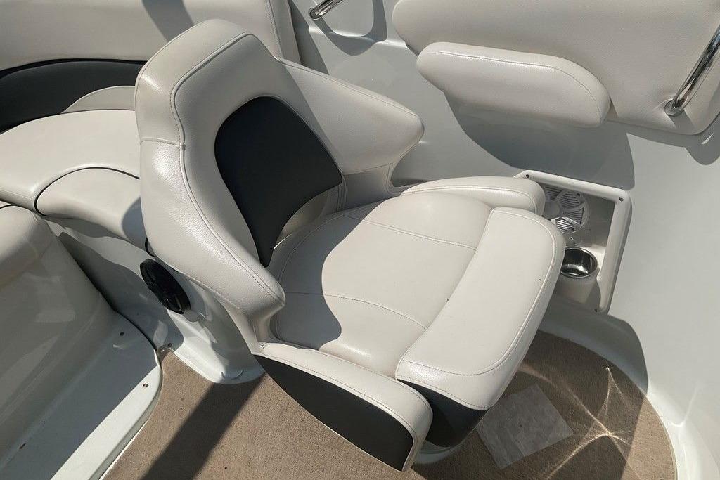 2015 Crownline 236 SC boat interior with plush seating and cup holder.