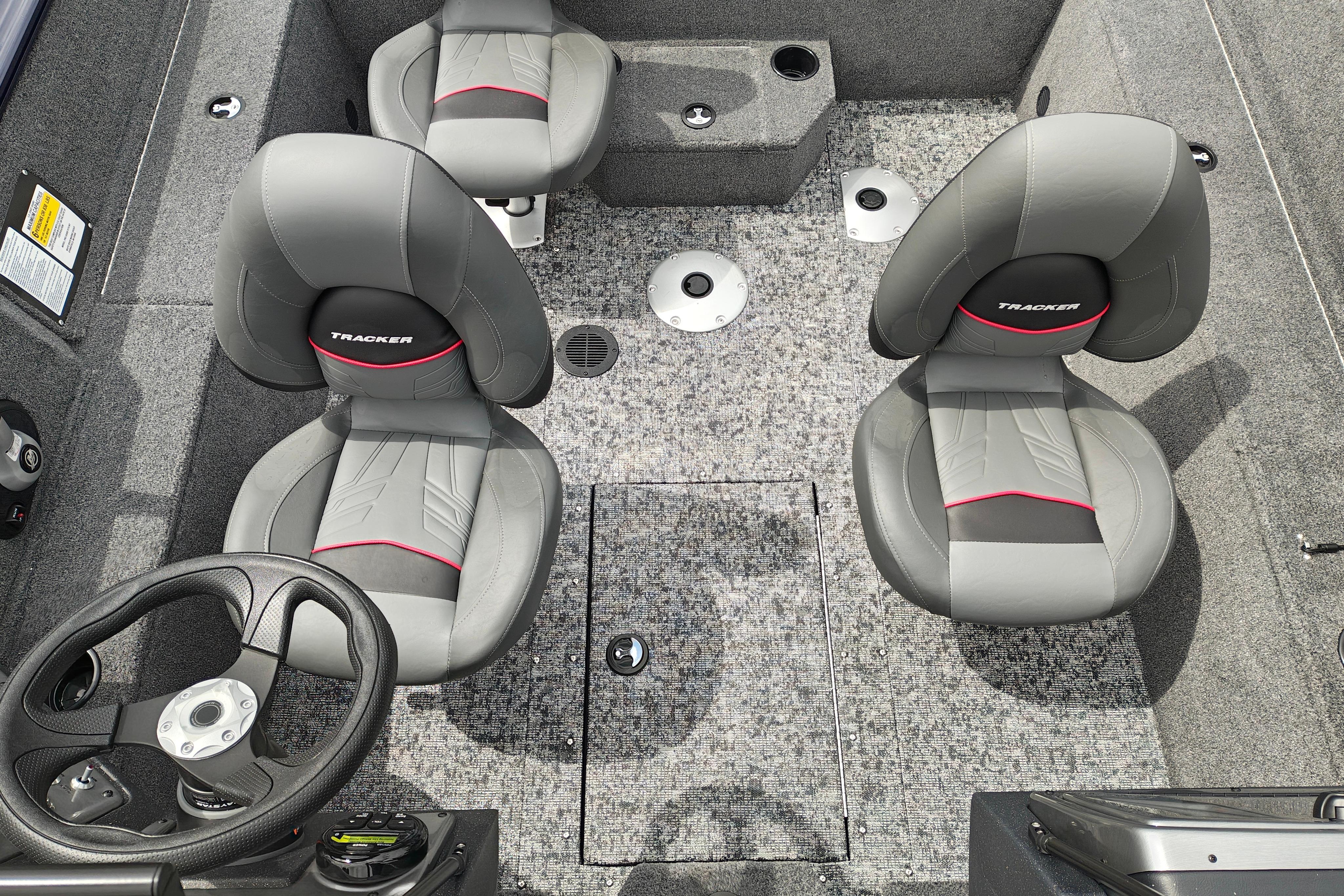 2026 Tracker Pro Guide V-175 WT boat interior with gray seating and steering wheel.