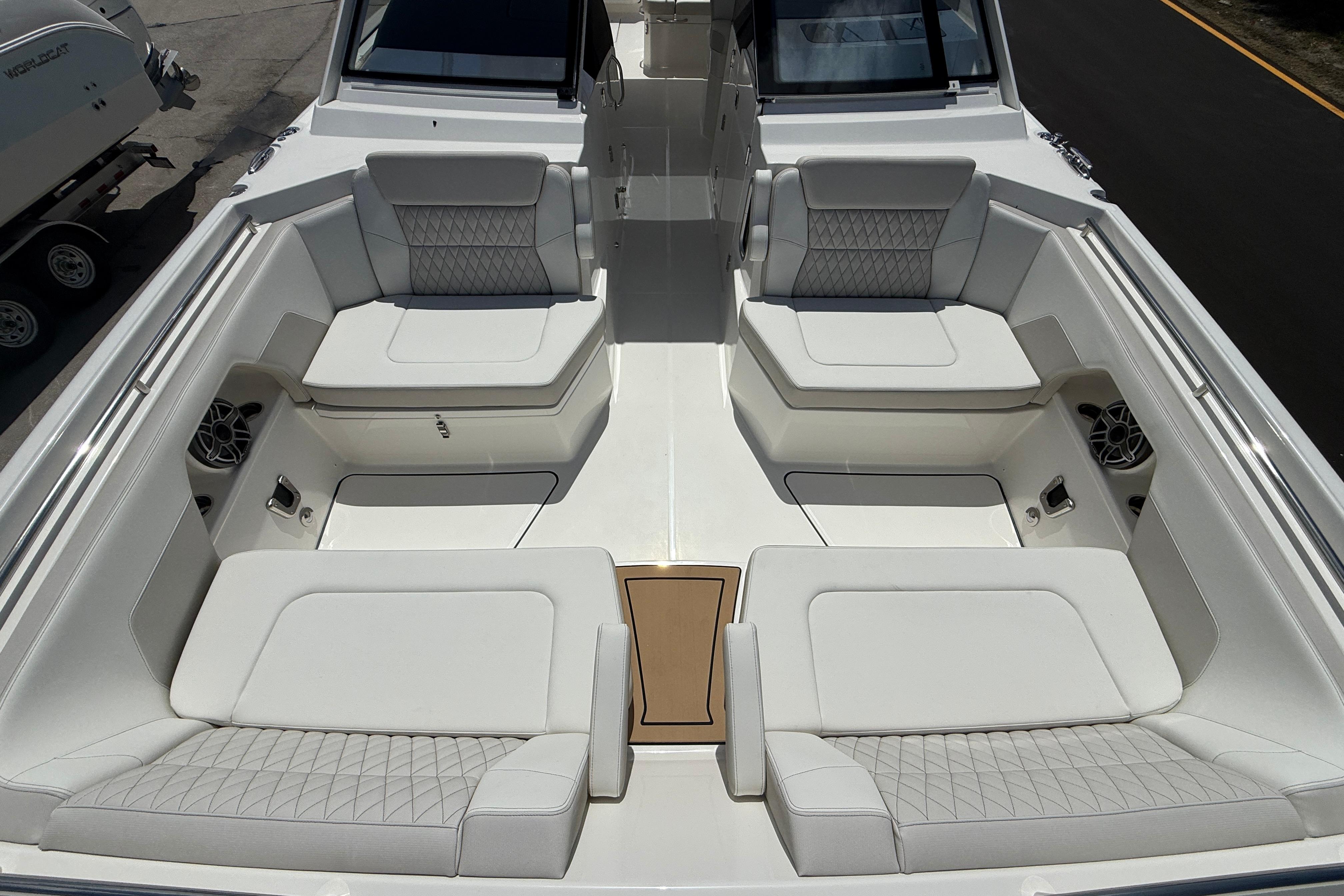 Luxurious seating area on 2026 World Cat 400 DC-X Island boat.