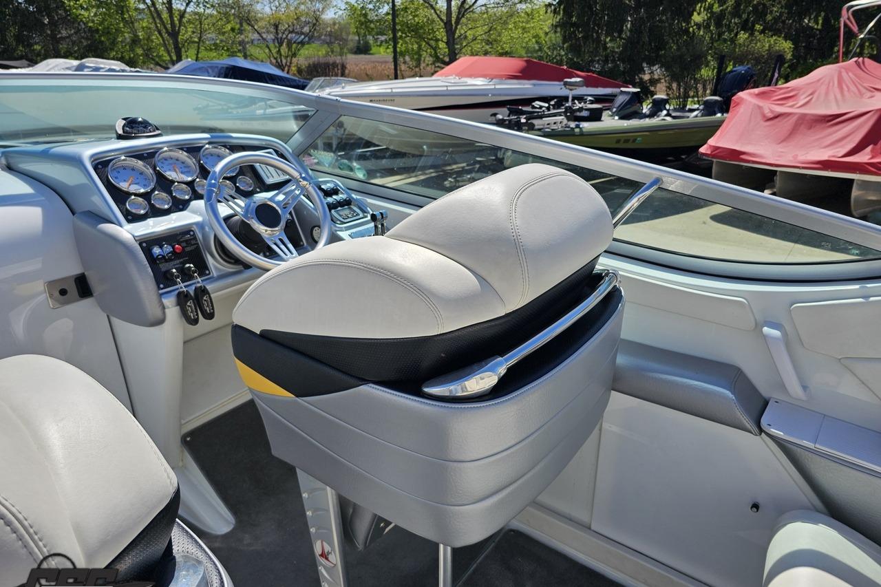 Interior of a 2014 Formula 292 FASTech boat, featuring sleek dashboard and seating.