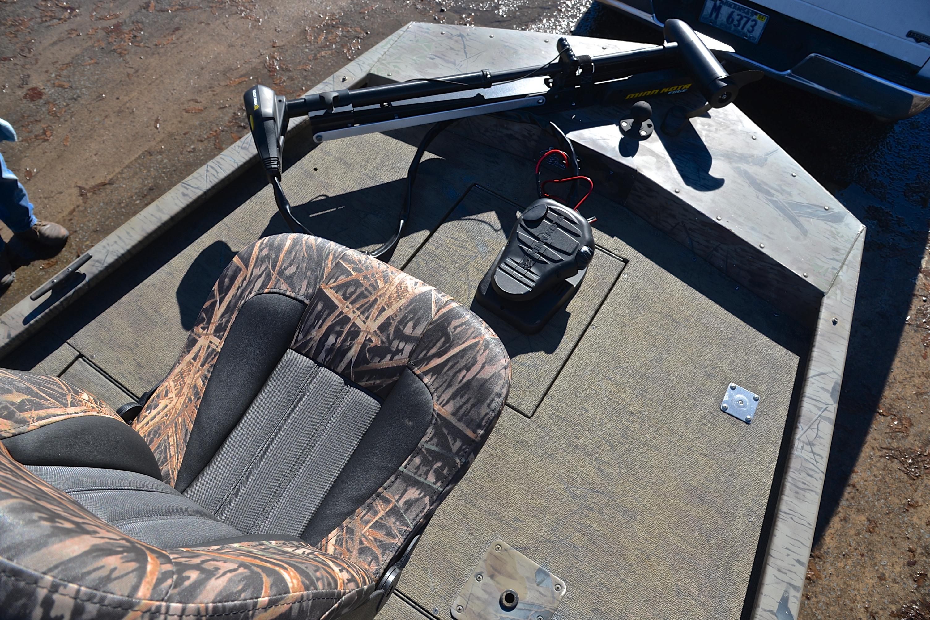 2016 G3 Eagle 176 boat interior with camo seat and trolling motor.
